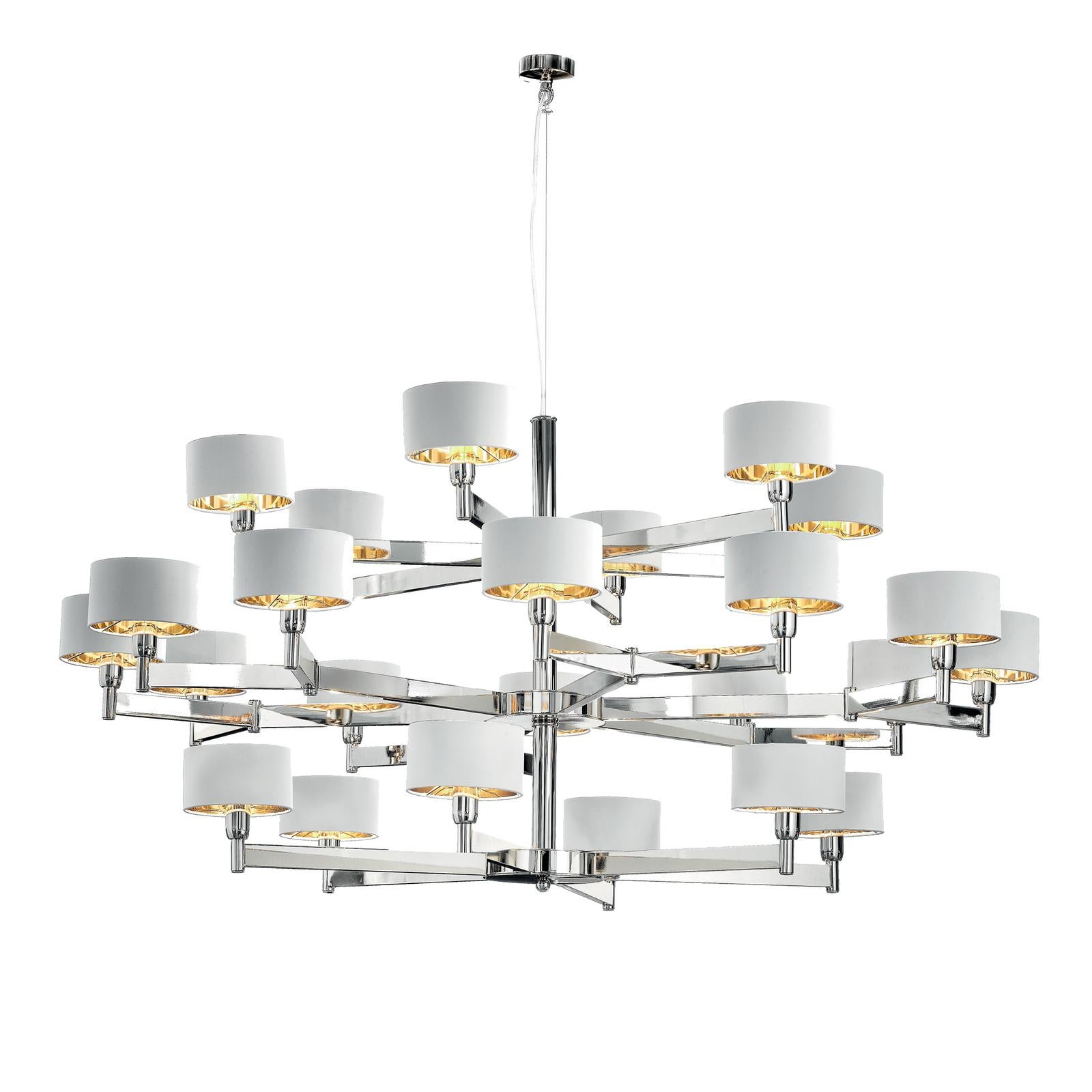 Recreating the mesmerizing movements and lightness of a butterfly, this stunning chandelier is a celebration of contemporary design and natural inspirations. The structure is in metal with a polished nickel finish that hangs from a vertical 50 cm