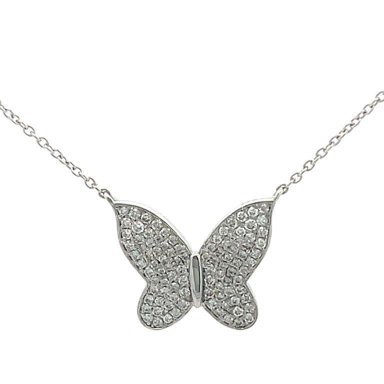 Introducing our exquisite 14K white gold butterfly necklace, a true symbol of elegance and grace. Crafted with impeccable precision, this stunning piece will capture your heart from the very first glance. The central feature of this necklace is a