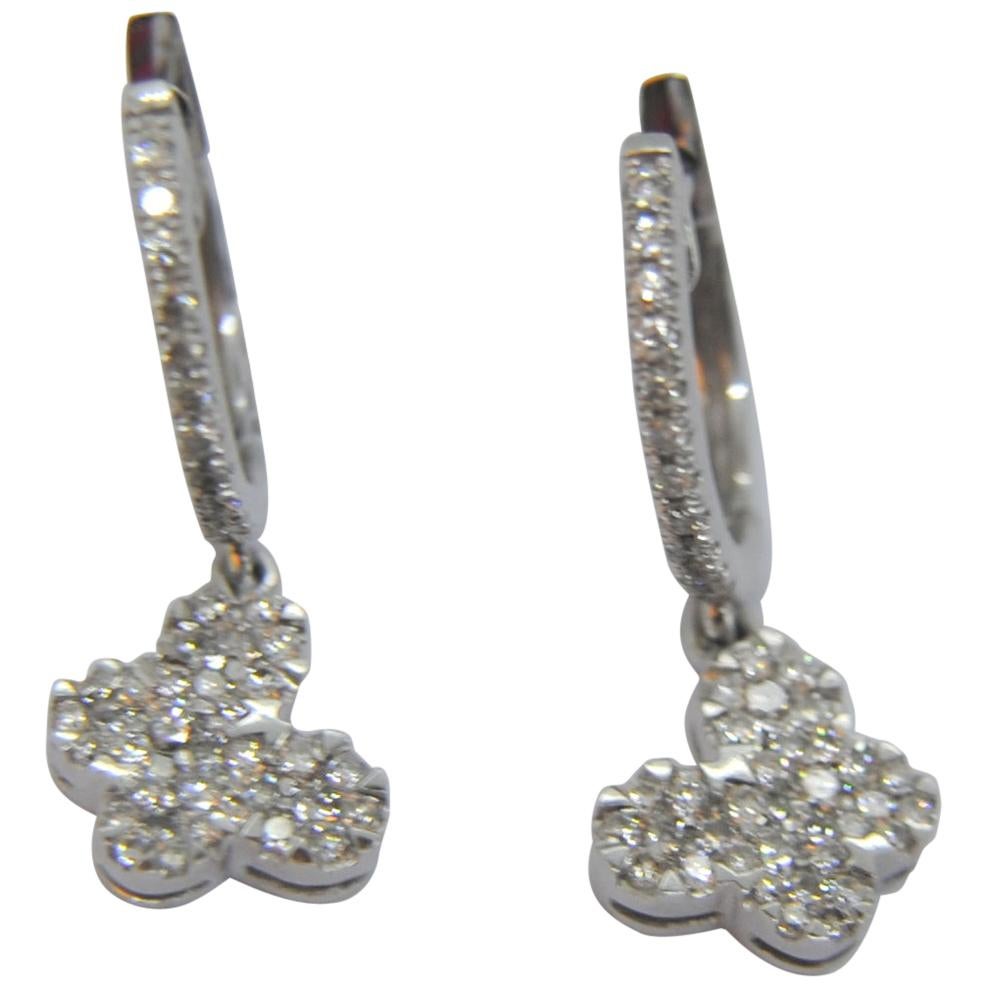 This pair of earrings weight 3.6grams and measures 25mm or 1,00 inches
Diamonds are pavé set 11 diamonds  of 0.01ct and the butterfly is form of 4 set of a round composition of 7 diamonds of 0.01ct which total each earring 0.39ct  total 0.78 ct