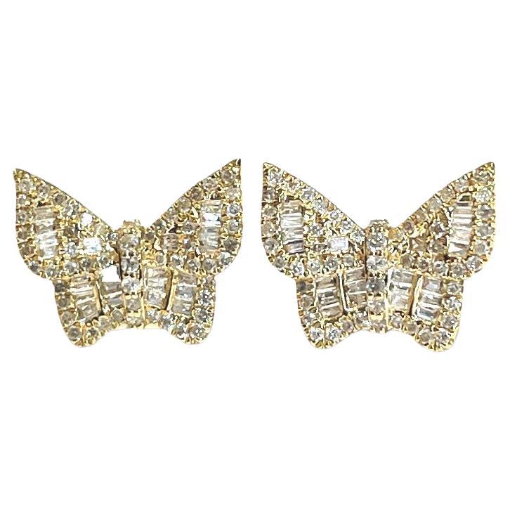 These elegant butterfly earrings are crafted from high-quality 14k yellow gold and feature sparkling 0.51tcw diamonds that catch the light beautifully.

The earrings are lightweight, weighing 2.53 grams, making them comfortable to wear all day long.