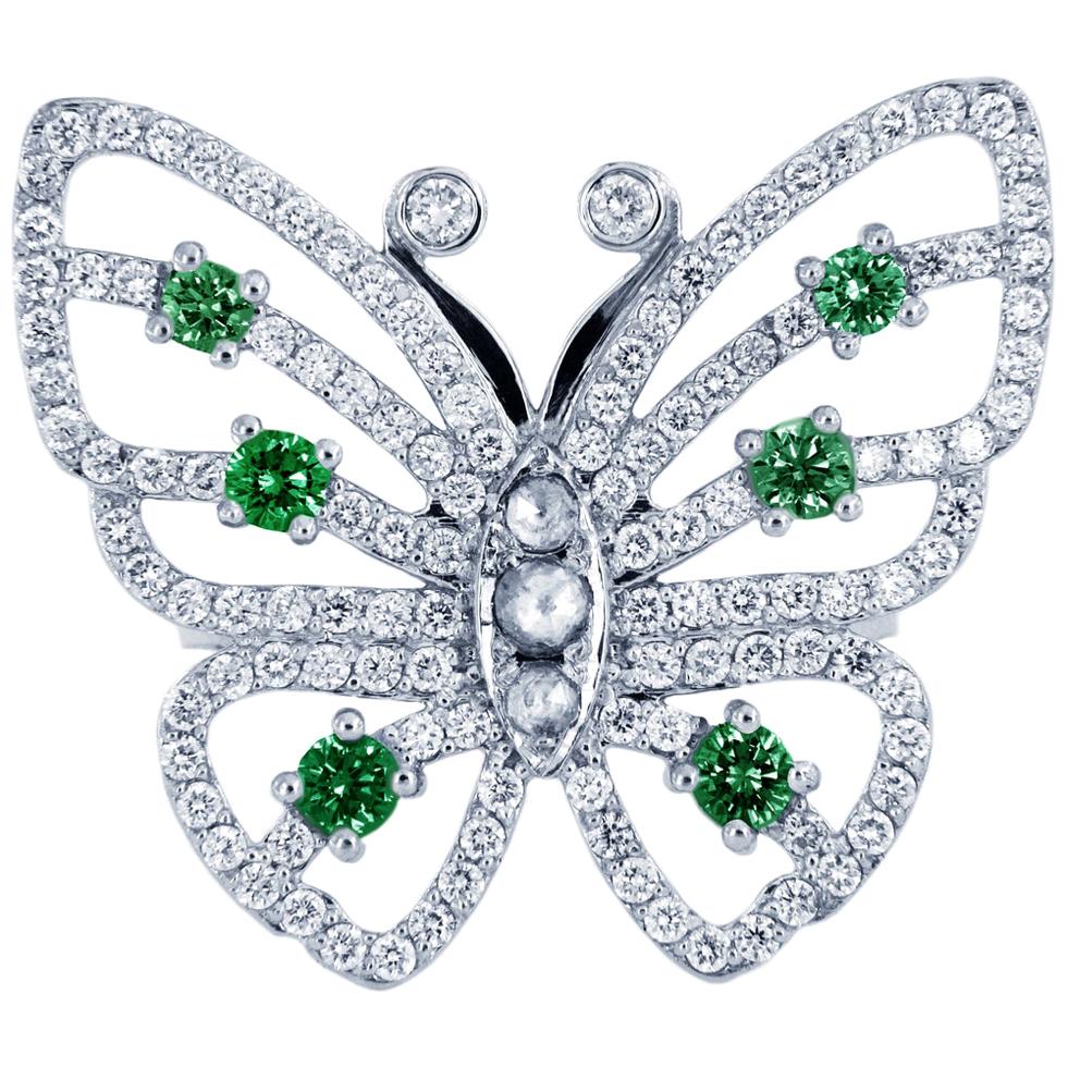 Ring aus 14 Karat Weißgold mit Schmetterling-Diamant und Smaragd im Angebot