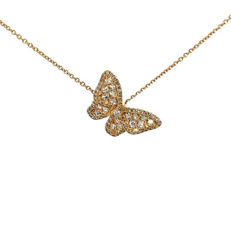 Introducing our exquisite 18K yellow gold butterfly pendant necklace, a true symbol of elegance and grace. This stunning piece is crafted with impeccable precision and is sure to capture your heart from the very first glance. The central feature of