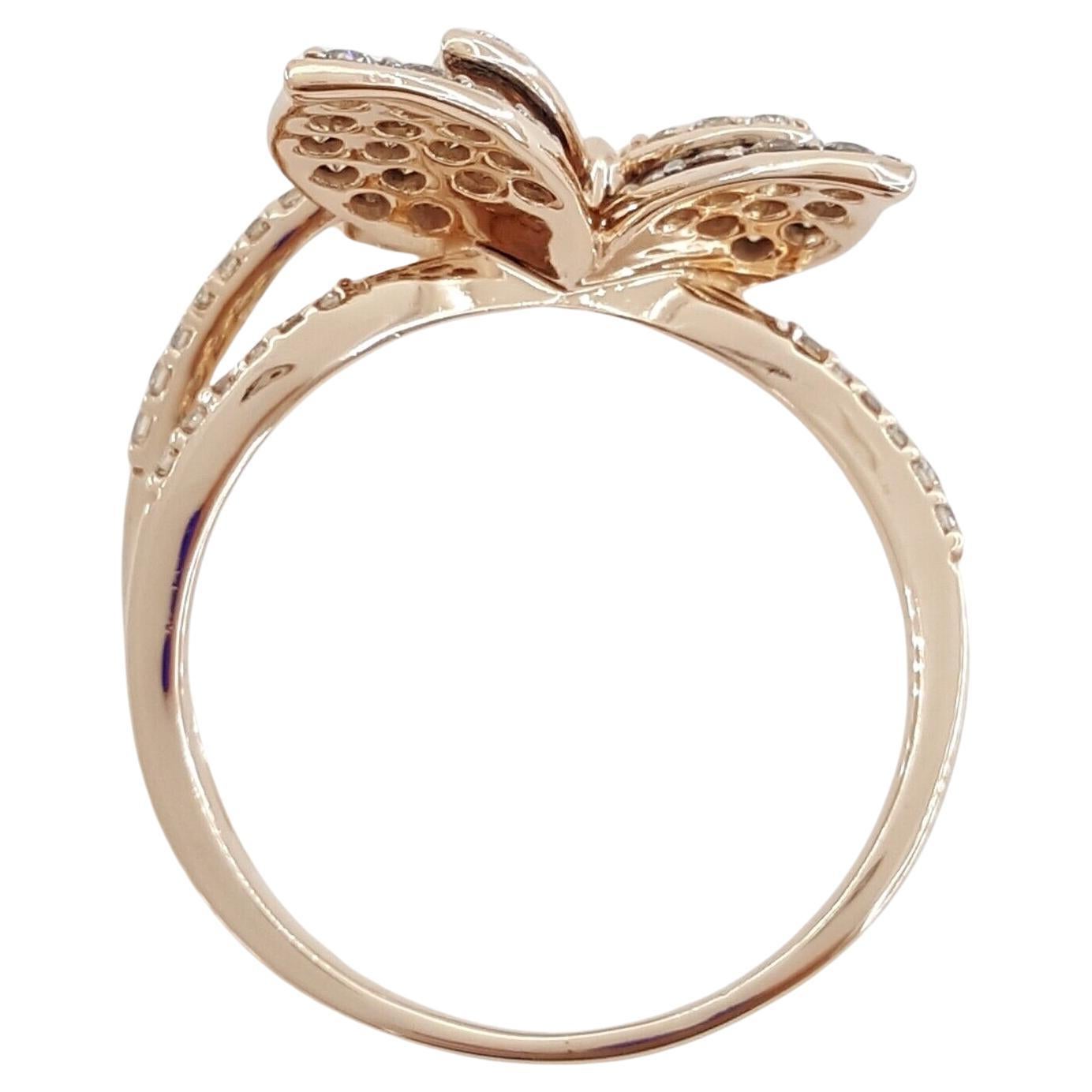 Butterfly Engagement / Statement Ring in 14K Rose/Strawberry Gold.



The ring weighs 4.8 grams, size 9, there are 32 Natural Round Brilliant Cut Chocolate & 35 Natural Nude Round Brilliant Diamonds weighing approximately 1 ct total weight,