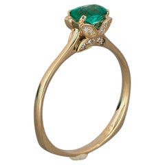 Butterfly gold Ring with emerald. 