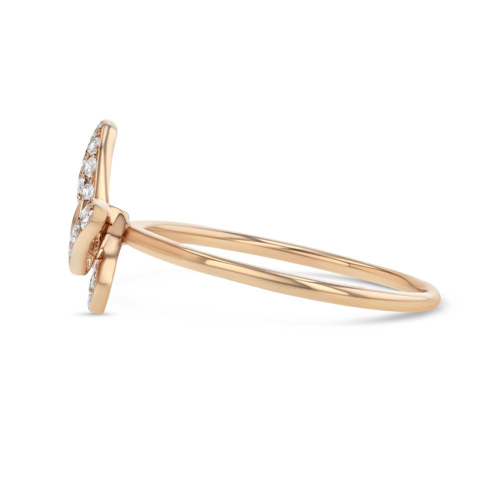 Our 18 karat rose gold and white diamond butterfly ring is a delicate treasure. With its unique tilt and gradually raised body, the piece captures one of nature's most precious moments where a butterfly will gently land on one's hand to say hello
