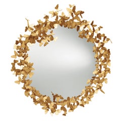 Miroir papillon en or brillant