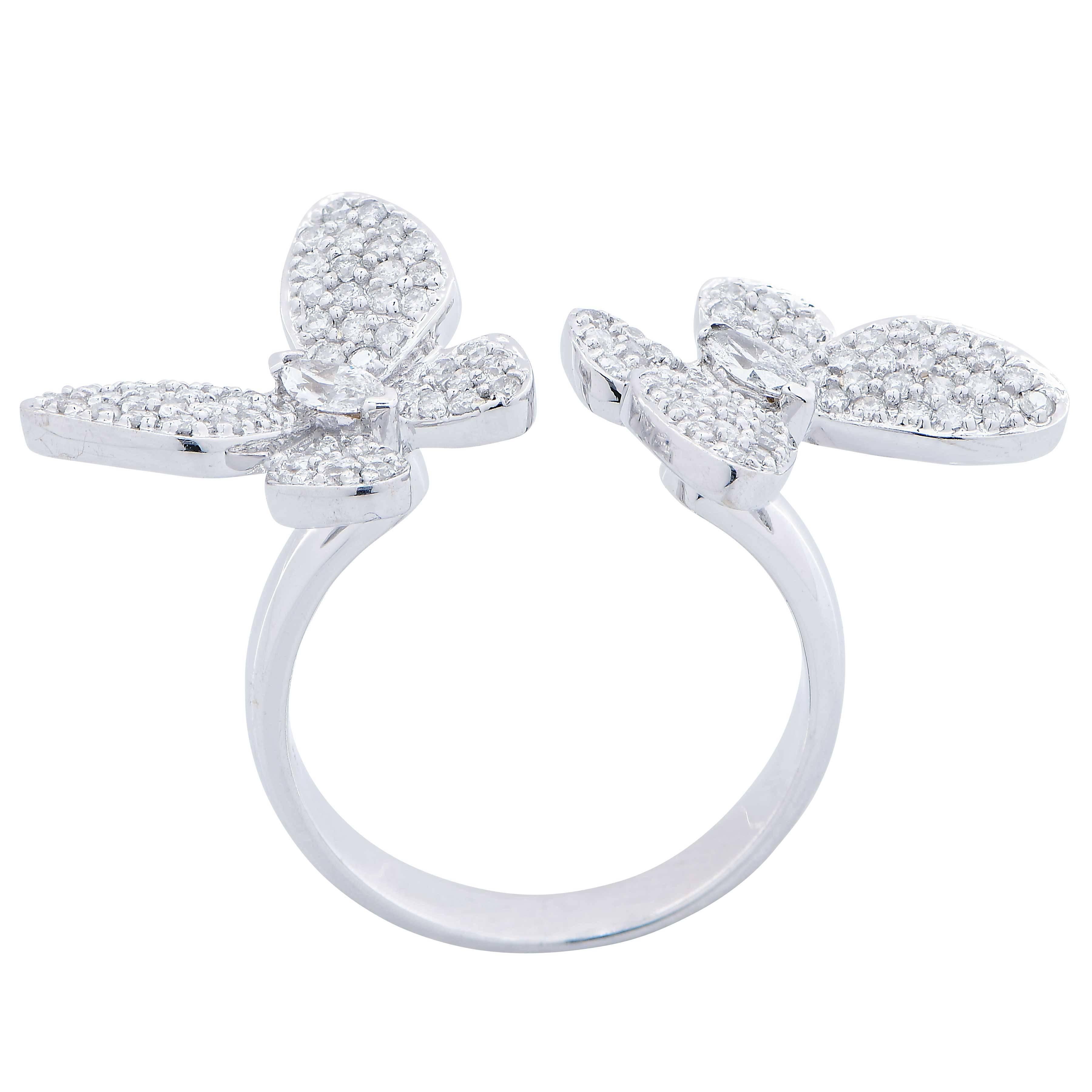 Butterfly motif diamond ring features 114 diamond with an estimated total weight of .89 carats set in 18 Karat White Gold.
Ring Size: 6 1/2 (Can be sized)
Metal Type: 18 Karat White Gold
Metal Weight: 7.6 Grams
