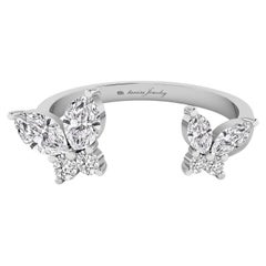 Anello aperto con farfalla e diamante in oro bianco 18 carati
