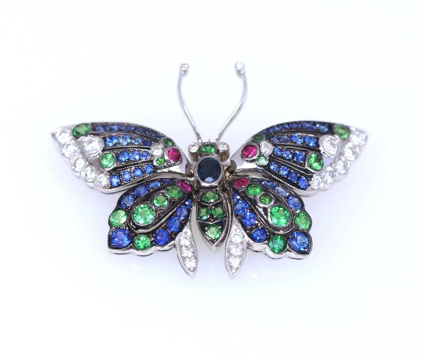 Butterfly Pendant and also a Brooch with fine Sapphires, Emeralds, Rubies and Diamonds.
The fine design and amazing execution of the jeweler not only mimicking the great natural forms and colours but also mimics the movement of the wings. Most of