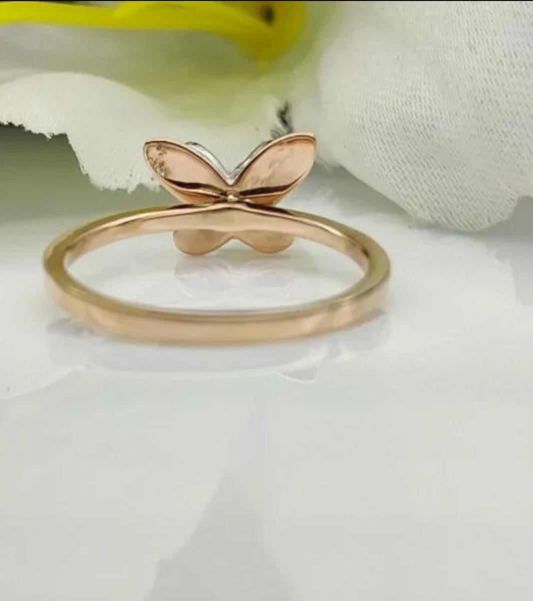 Butterfly Ring 14k Gold Diamond Butterfly Band Natural Diamond Birthday Gift.

Ring Gross Weight
2.07 Grams Approx
Features
Nickel-Free
Base Metal
Yellow Gold
Certification
14K hallmarked, IGI
Main Stone Color
White/Colorless
Diamond Weight
0.05 Cts