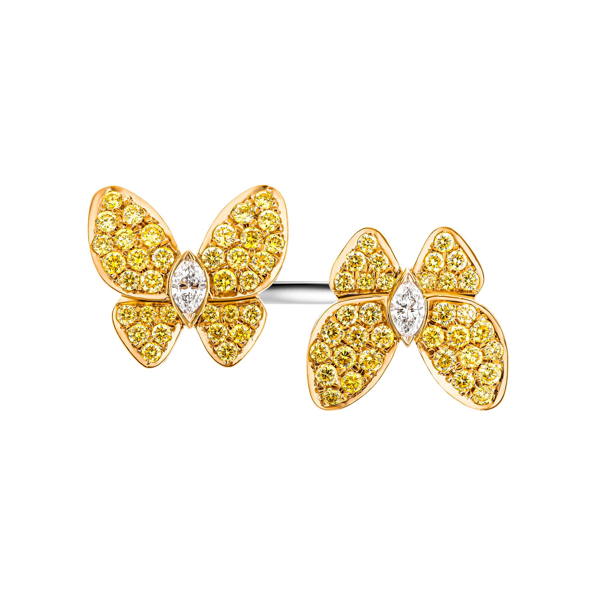 Bague papillon en or jaune et or blanc 18 carats Avec 
Poids total en carats du pavé jaune : 1.36ct 
Diamant Marquee : 0,47ct 
Taille : 7 ¼