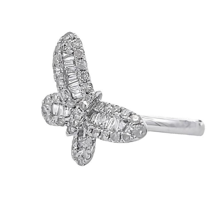 Introducing the stunning Diamond Butterfly Ring, a true masterpiece that is sure to take your breath away! This beautiful ring features a delicate butterfly design that captures the essence of nature's beauty and grace. This fashion ring is made in