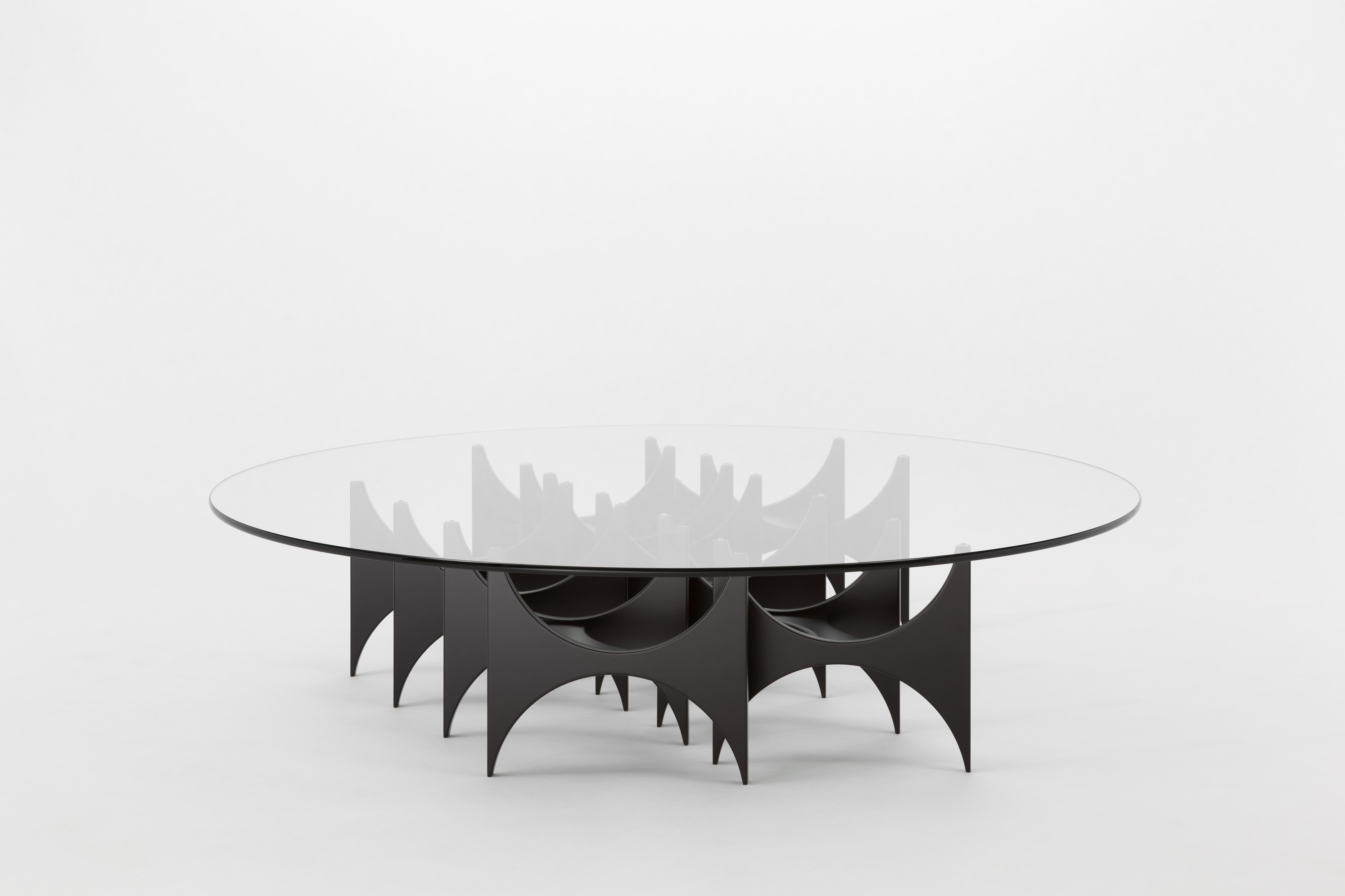Butterfly round coffee table by SEM
Dimensions: D140x H31.2 cm
Material: Glossy lacquered finish.
Costumized sizes, colors and top available on request. Available in all RAL color. Top in extralight glass.

The 'Butterfly' coffee table is also