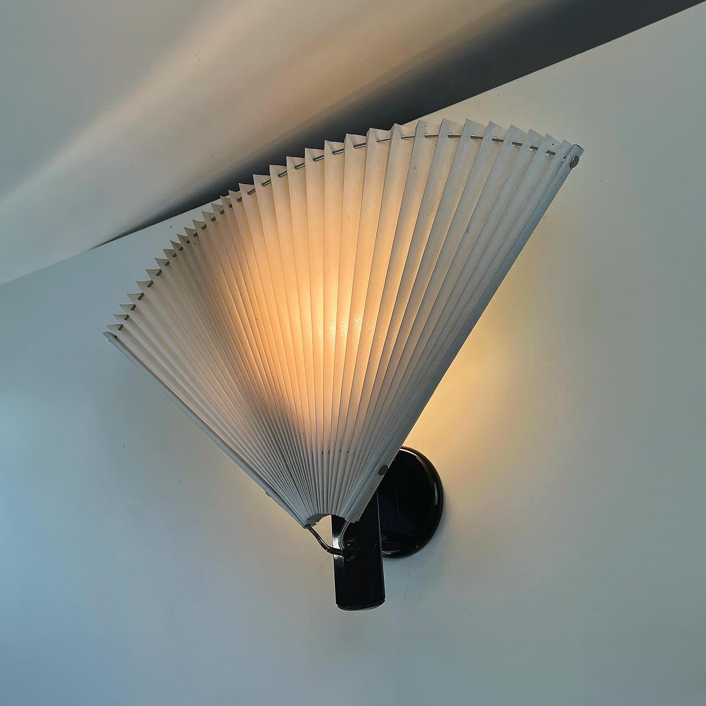 Butterfly Sconce by Tobia and Afra Scarpa for Flos, Italy 1980s.

Introducing the breathtaking Butterfly sconce, a true masterpiece designed by the talented duo, Afra and Tobia Scarpa, exclusively for Flos. Immerse yourself in the enchanting allure