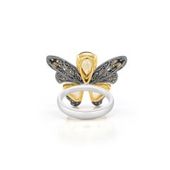 Butterfly style Cocktail Ring with Natural Fancy Color diamonds in 18K Gold