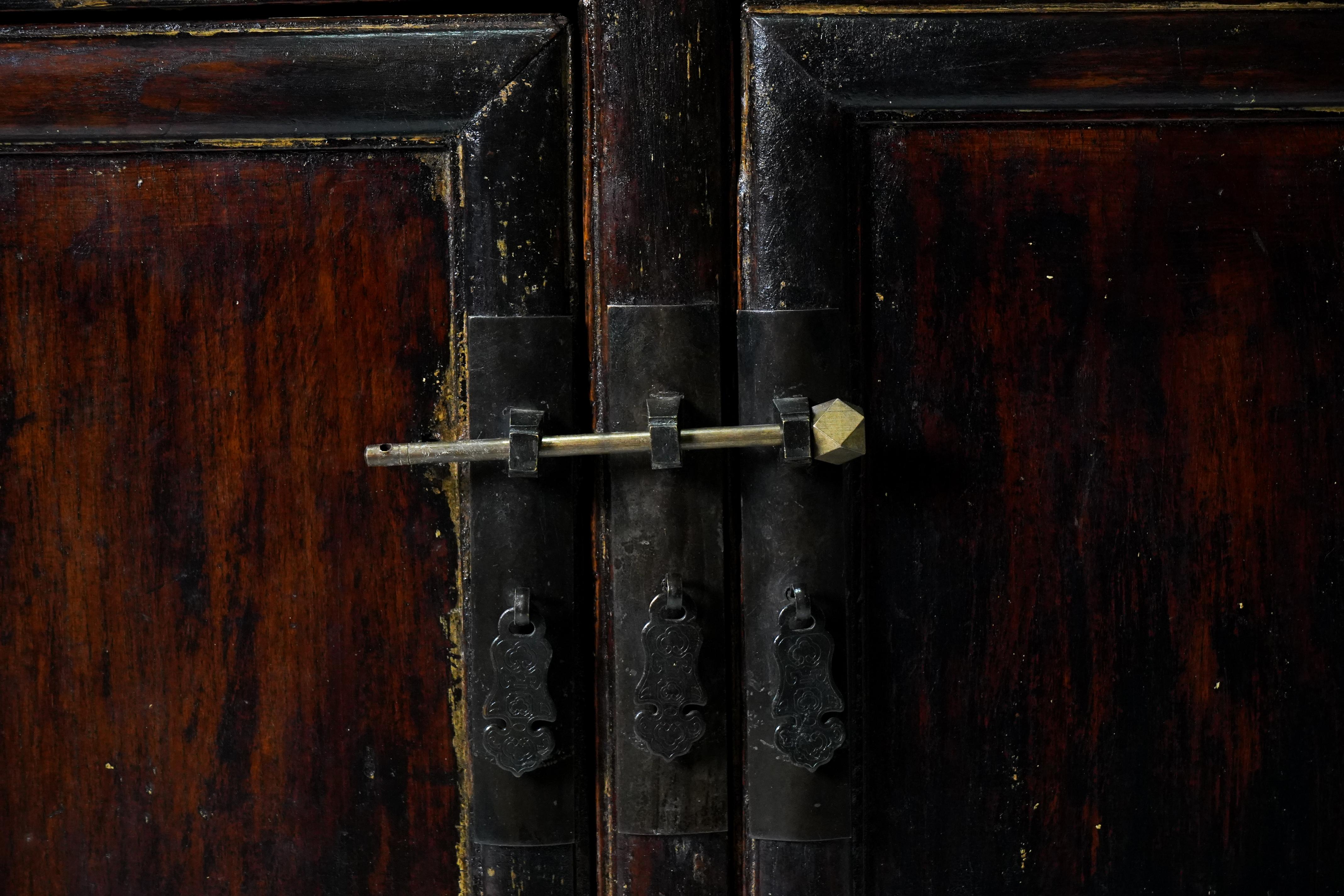 Butterfly Style Storage Cabinet with Carved Spandrels  2