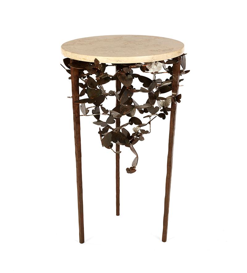 Hand-bent butterfly wings in a variety of sizes support a white marble top with a metal base in an Aged Gold finish. No two are alike as they are made to order in the custom size and finish of your choice. Call for ready-to-ship sizes.

Geode top