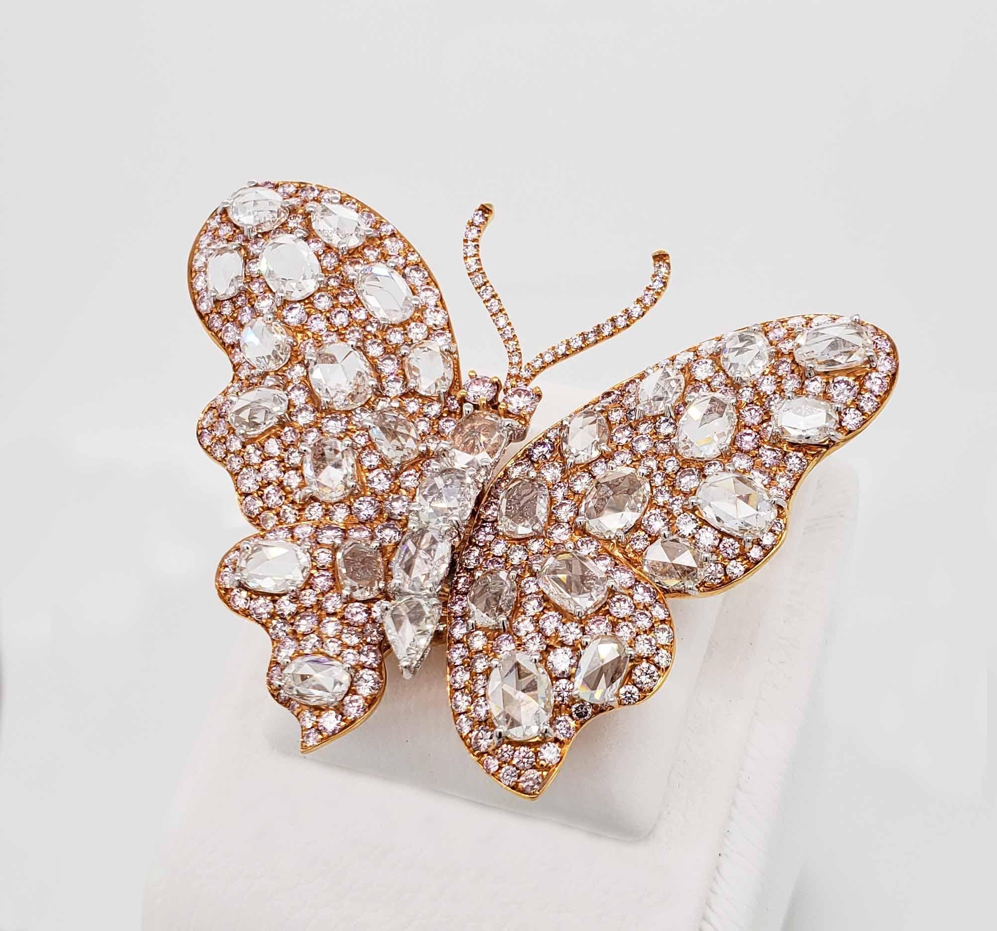 This Beautiful Rose Cut Diamond Butterfly brooch has movable wings for multiple positions.  A true one-of-a-kind Scarselli couture creation with 10 carats of Rose cut diamonds and 7 carats of fancy pink diamonds mounted in rose gold.  This brooch