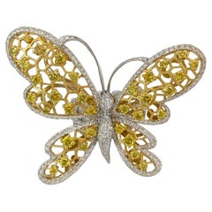 Bague papillon en diamants blancs et jaunes