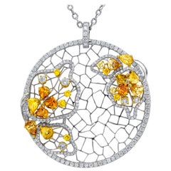 Pendentif papillon en diamants jaunes et blancs