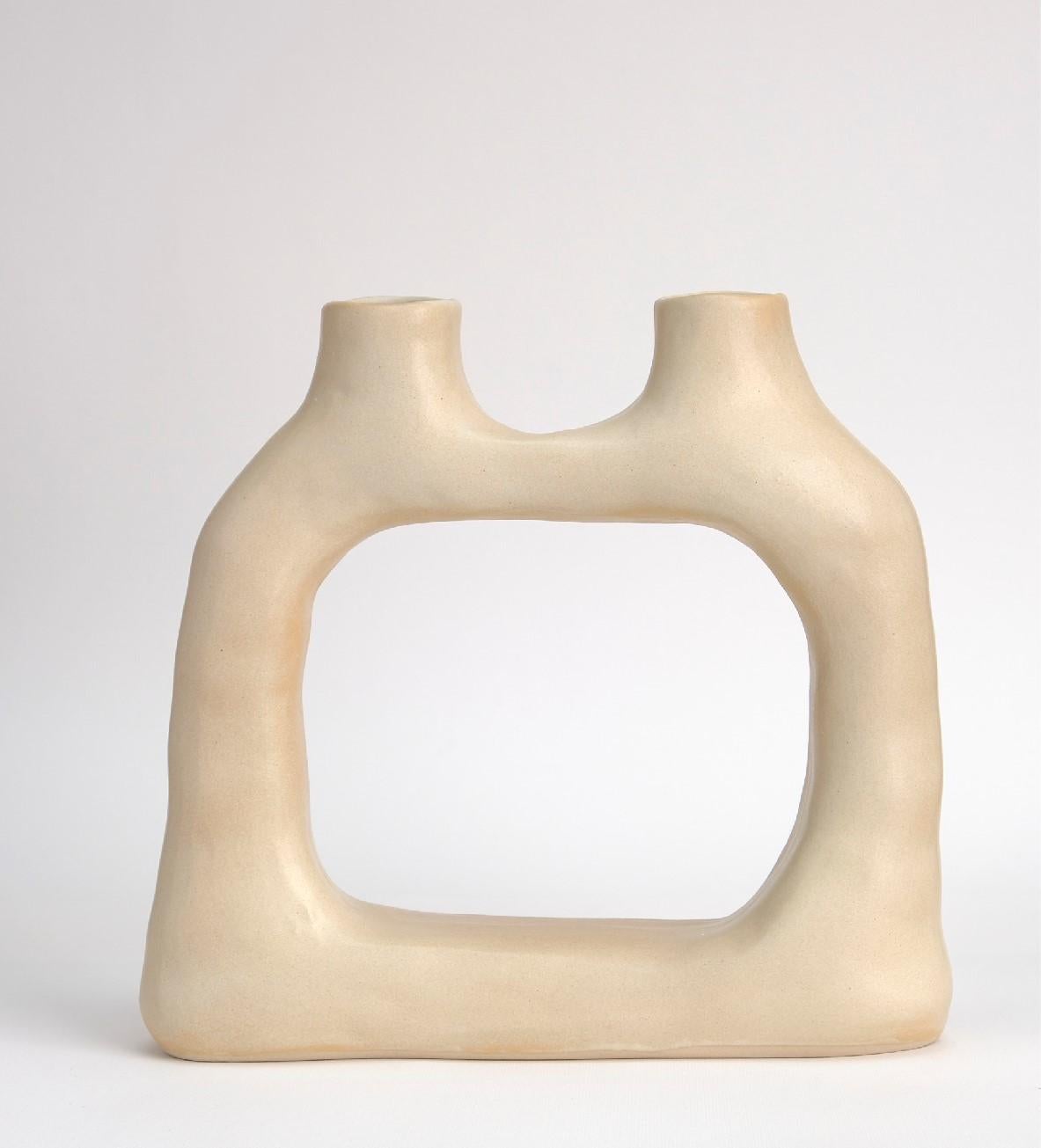 Buttermilk dual No.2 stoneware vase by Camila Apaez
One of a kind
Materials: Stoneware
Dimensions: 23 x 8 x 19 cm 
Options: white bone, butter milk, charcoal black

This year has been shaped by the topographies of our homes and the uncertainty