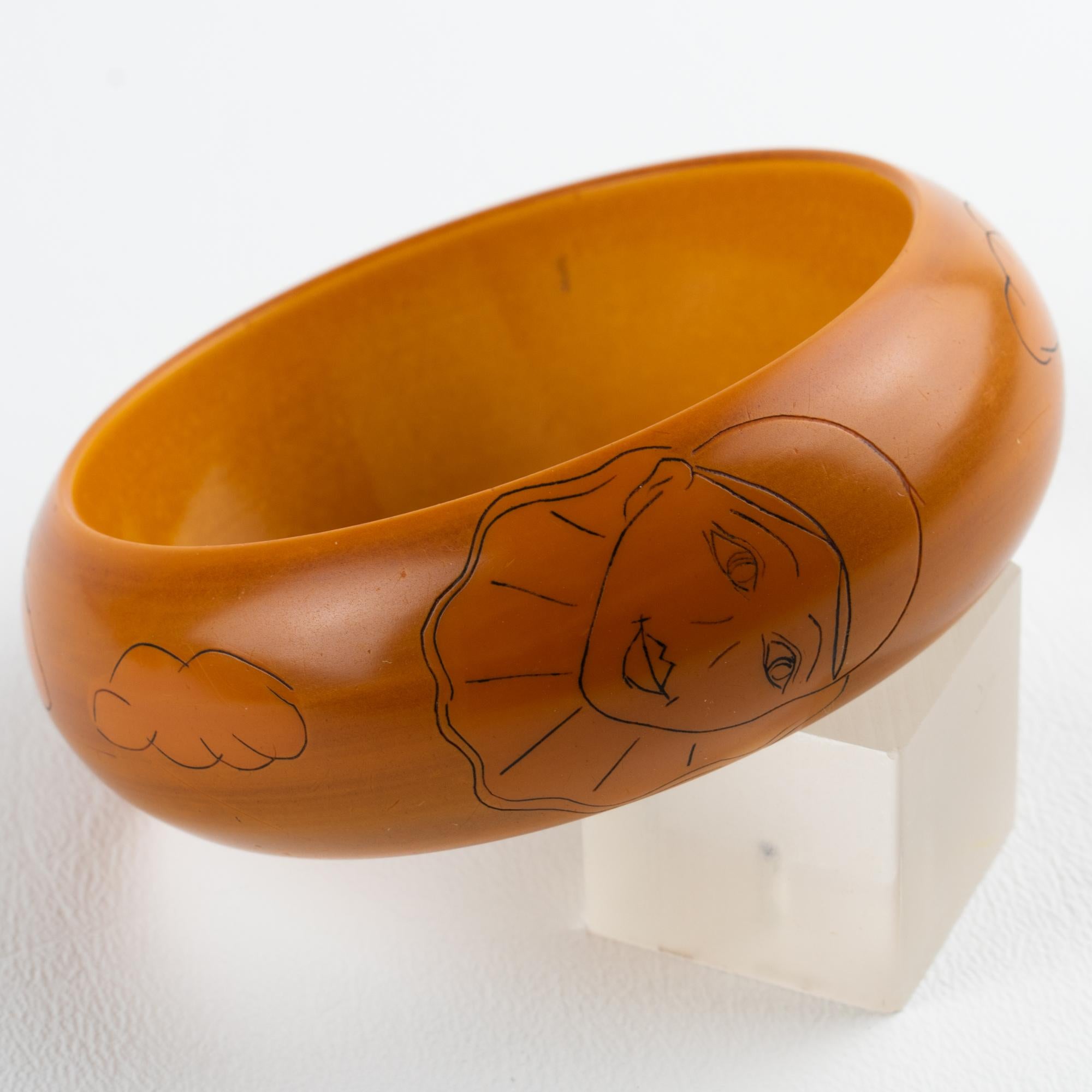 Butterscotch Bakelite Bracelet Bangle with Pierrot Design by Butler and Wilson In Good Condition For Sale In Atlanta, GA