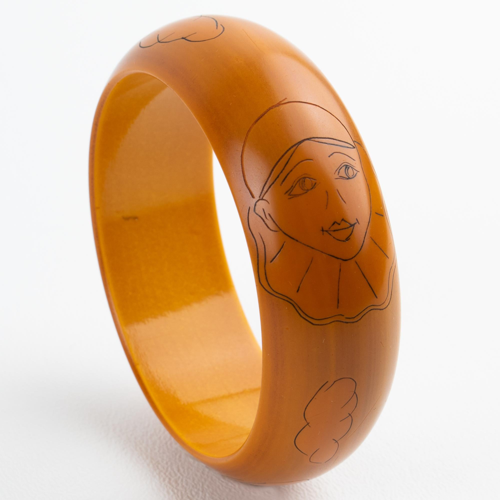 Butterscotch Bakelite Bracelet Bangle with Pierrot Design by Butler and Wilson For Sale 1