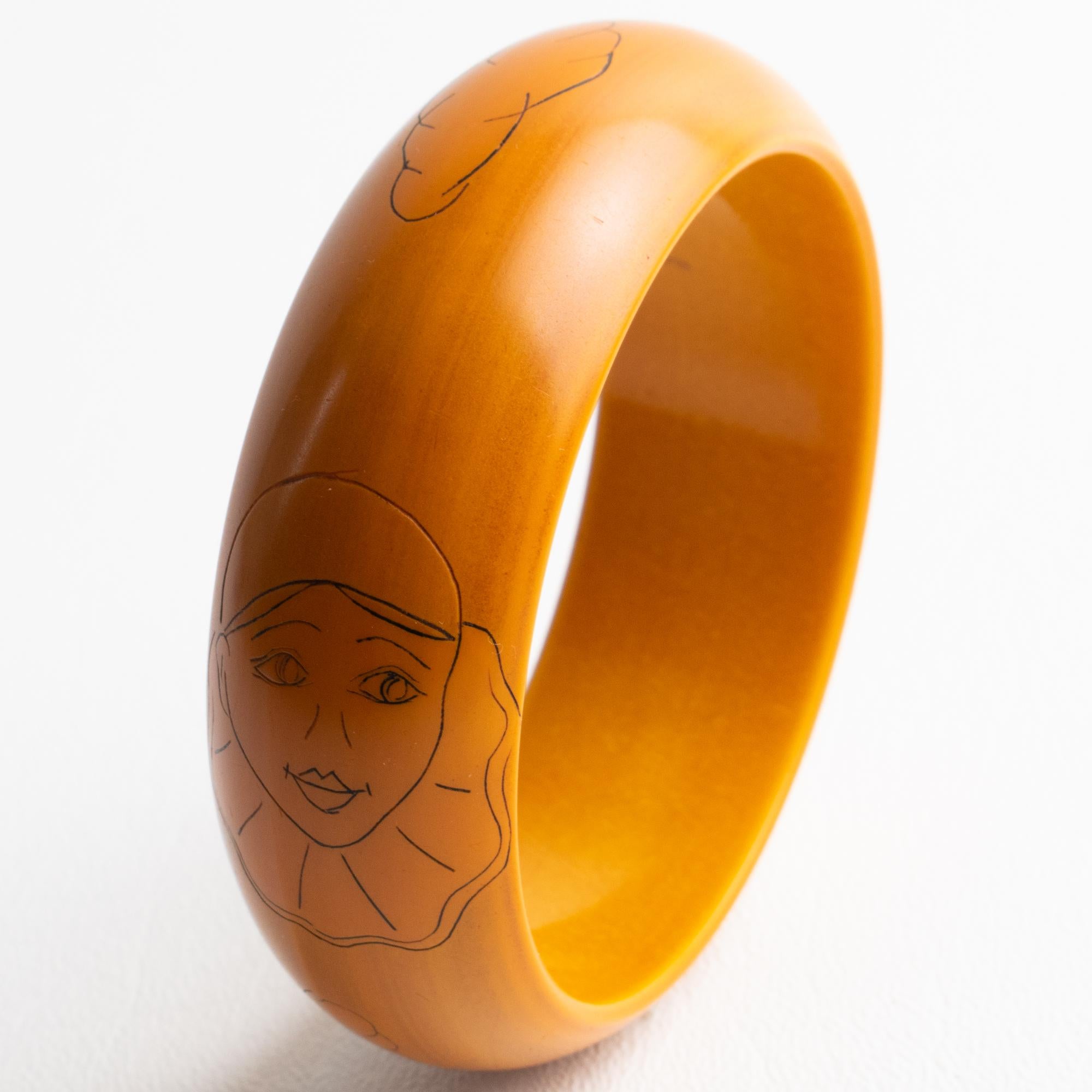Butterscotch Bakelite Bracelet Bangle with Pierrot Design by Butler and Wilson For Sale 2