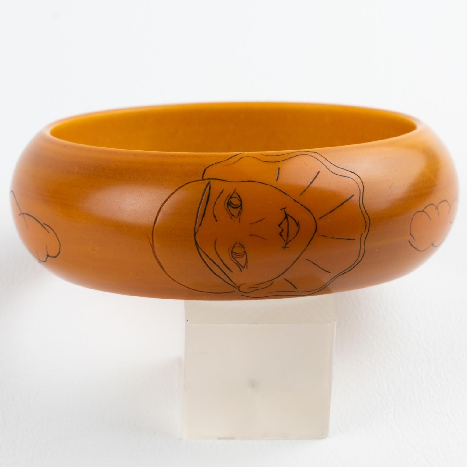 Butterscotch Bakelite Bracelet Bangle with Pierrot Design by Butler and Wilson For Sale 3