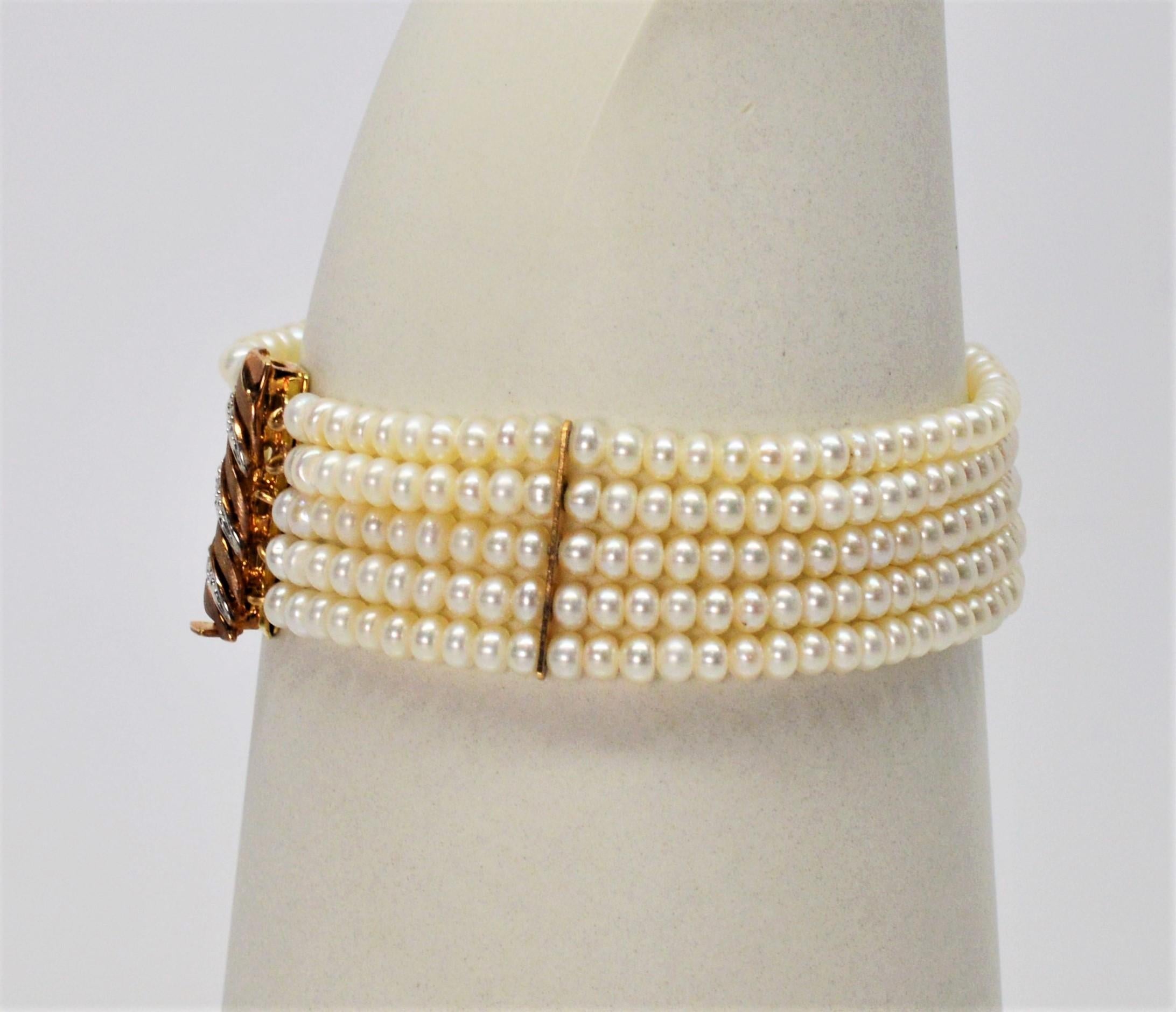 Round Cut Button Pearl Multi Strand Bracelet with Gold Diamond Swirl Charm Clasp