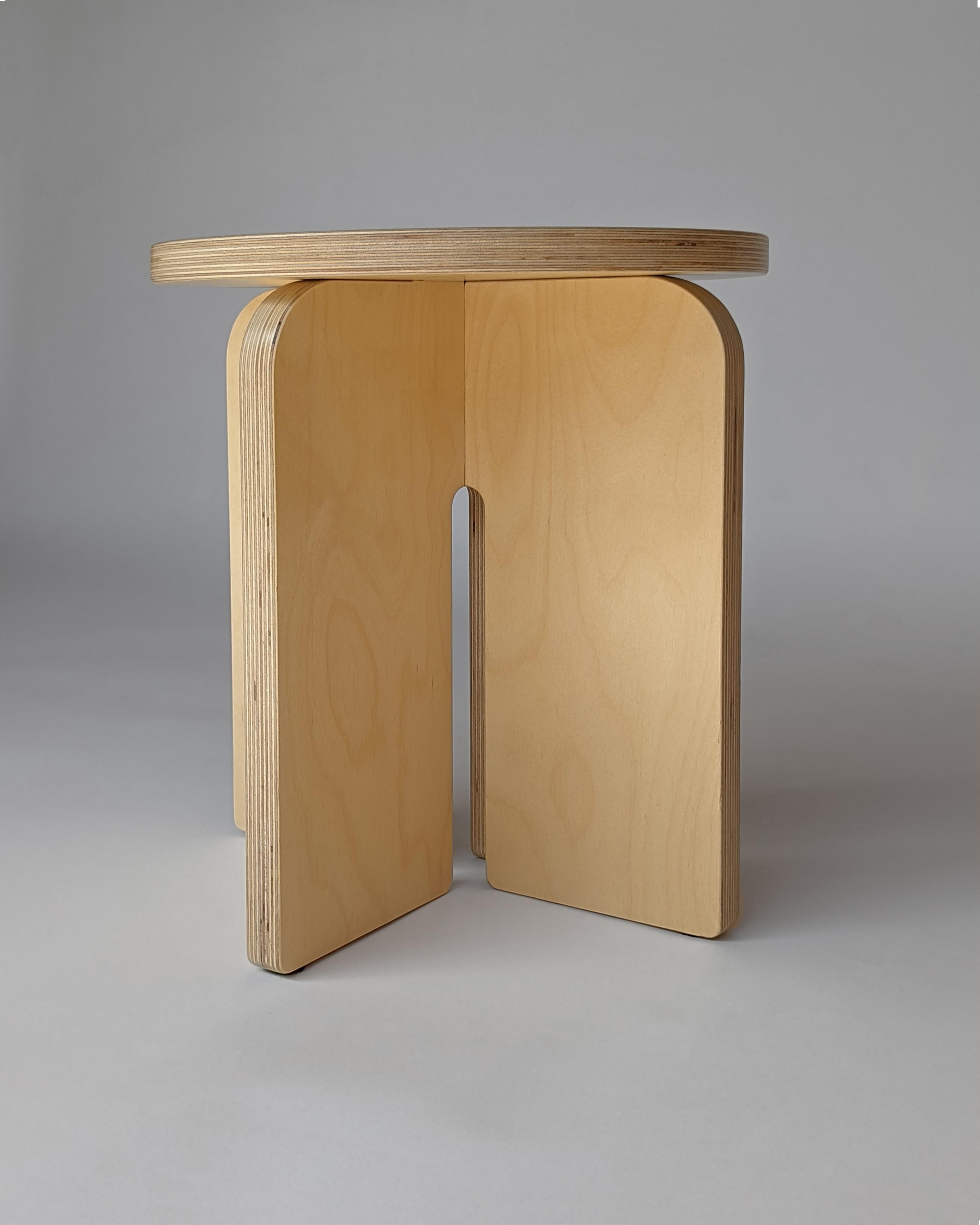 The Button stool is made from high quality Baltic birch plywood. It has a slightly warm, clear satin finish on the light natural wood that ages beautifully with time. The Button Stool has a round top, curved legs, with eased edges all around for an