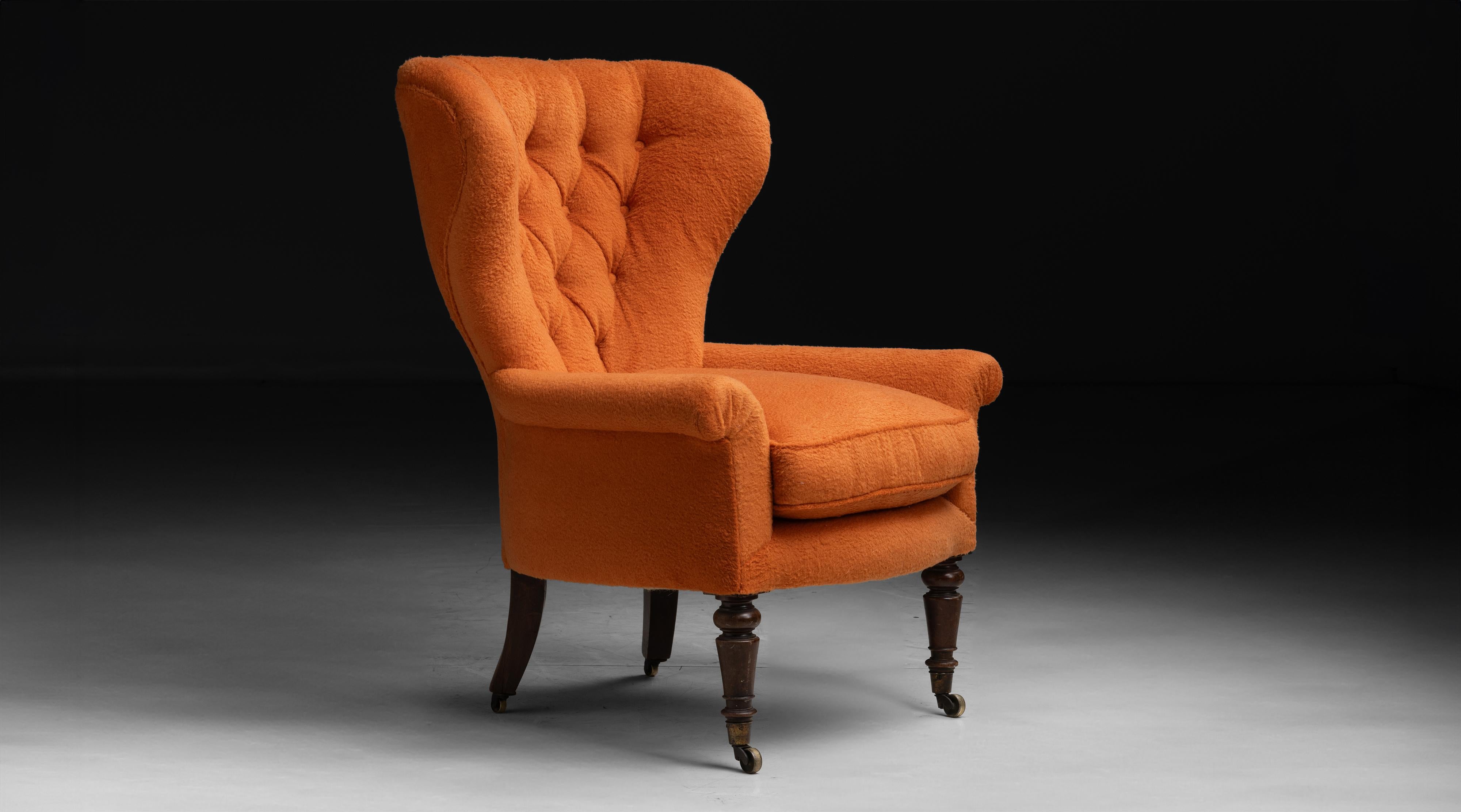 England circa 1820
Antique buttonback armchair frame, newly upholstered in Bichon orange fleece by Rosemary Hallgarten.
31”w x 27”d x 42.5”h x 22”seat