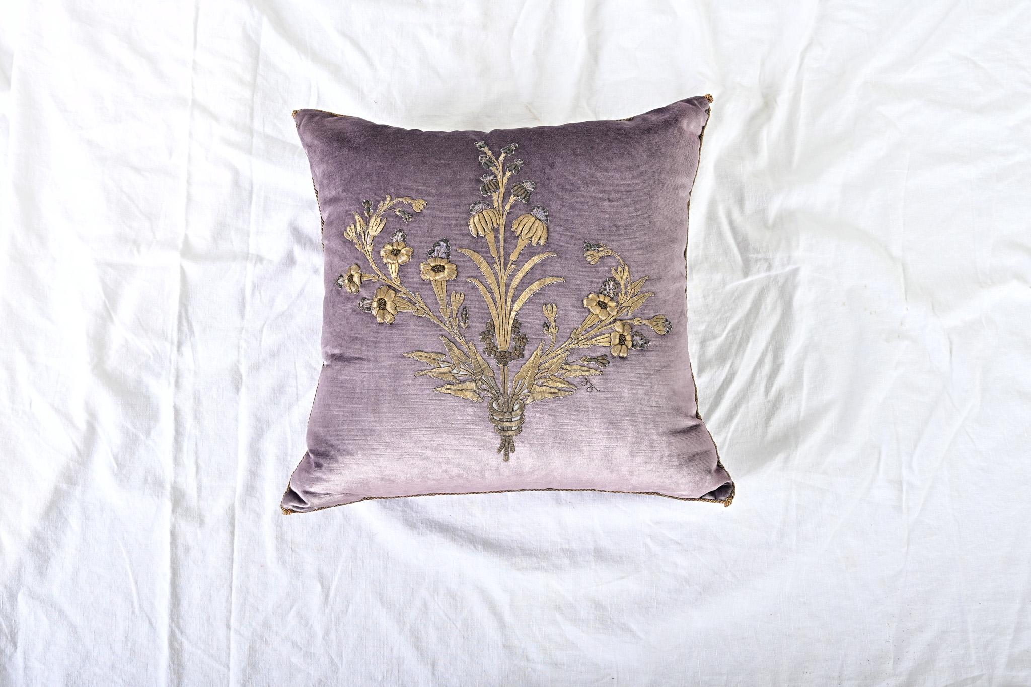 Recently made toss pillow from antique, Ottoman Empire raised silver metallic embroidery depicting a small bouquet of flowers on lavender velvet.  Hand trimmed with vintage gold metallic cording, knotted in the corners. Down-filled. Please view the