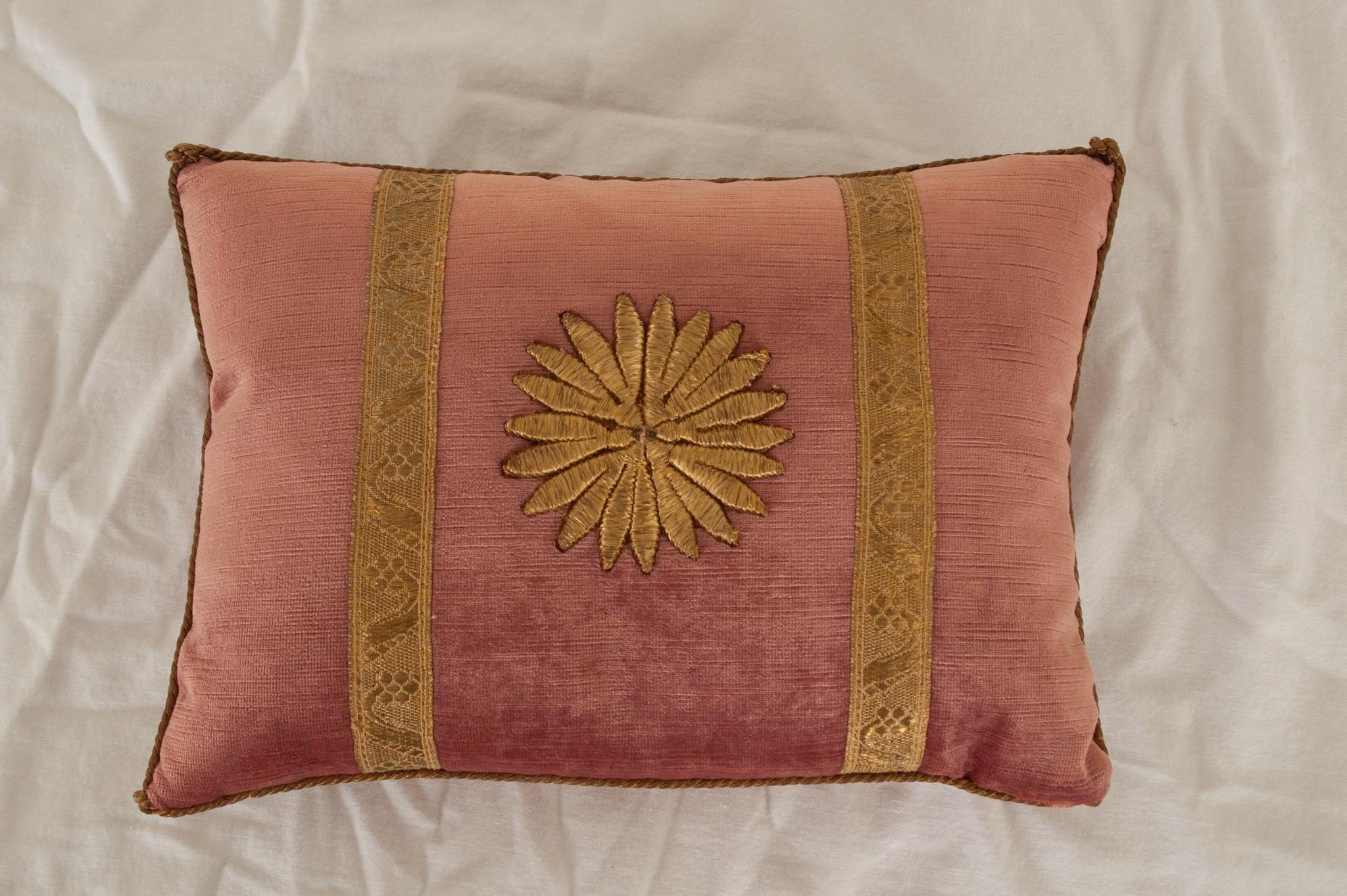 A darling accent pillow by B.Viz Designs to brighten any space. Raised metallic gold Ottoman Empire sunburst embroidery framed with antique gold metallic galon on dusty rose velvet. Hand trimmed with vintage gold cording, knotted in the corners.