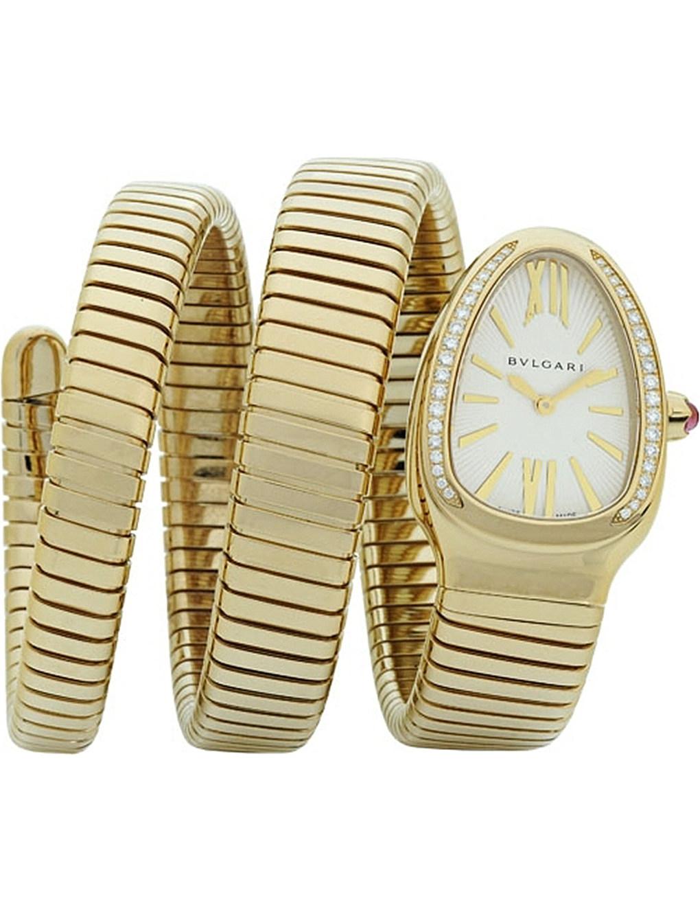 Gender: Ladies
Movement: Quartz
Functions: Hours, Minutes, Inlay
Case material: 18kt Yellow Gold
Case color: Gold Tone
Case incrustation: Diamonds
Case Shape: Complex Shape
Diameter: 35 mm
Bezel: Fixed, Inlay, Gold Tone
Case Back: Solid
Water