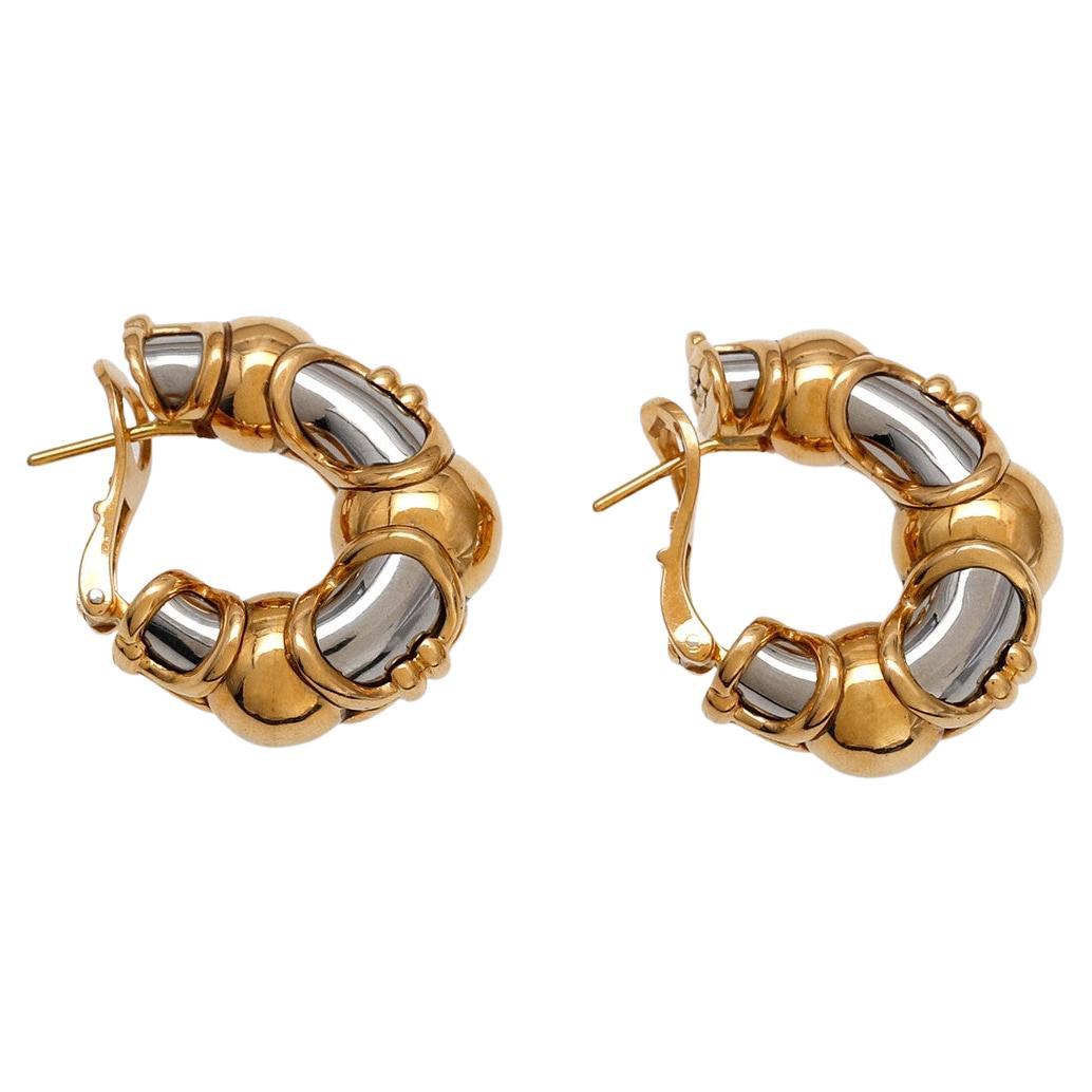 Bvlgari 18 karat yellow gold and steel hoop earrings