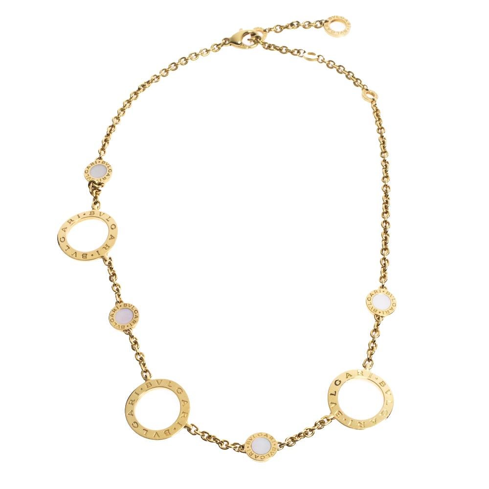 
Bvlgari 18 Karat yellow  Gold Signature 7 Circle Mother of Pearl Link Necklace, 35 Grams
Grown from the Roman roots of the brand into an elegant fusion of culture and modernity, the BVLGARI BVLGARI Necklace is an effervescent, contemporary
