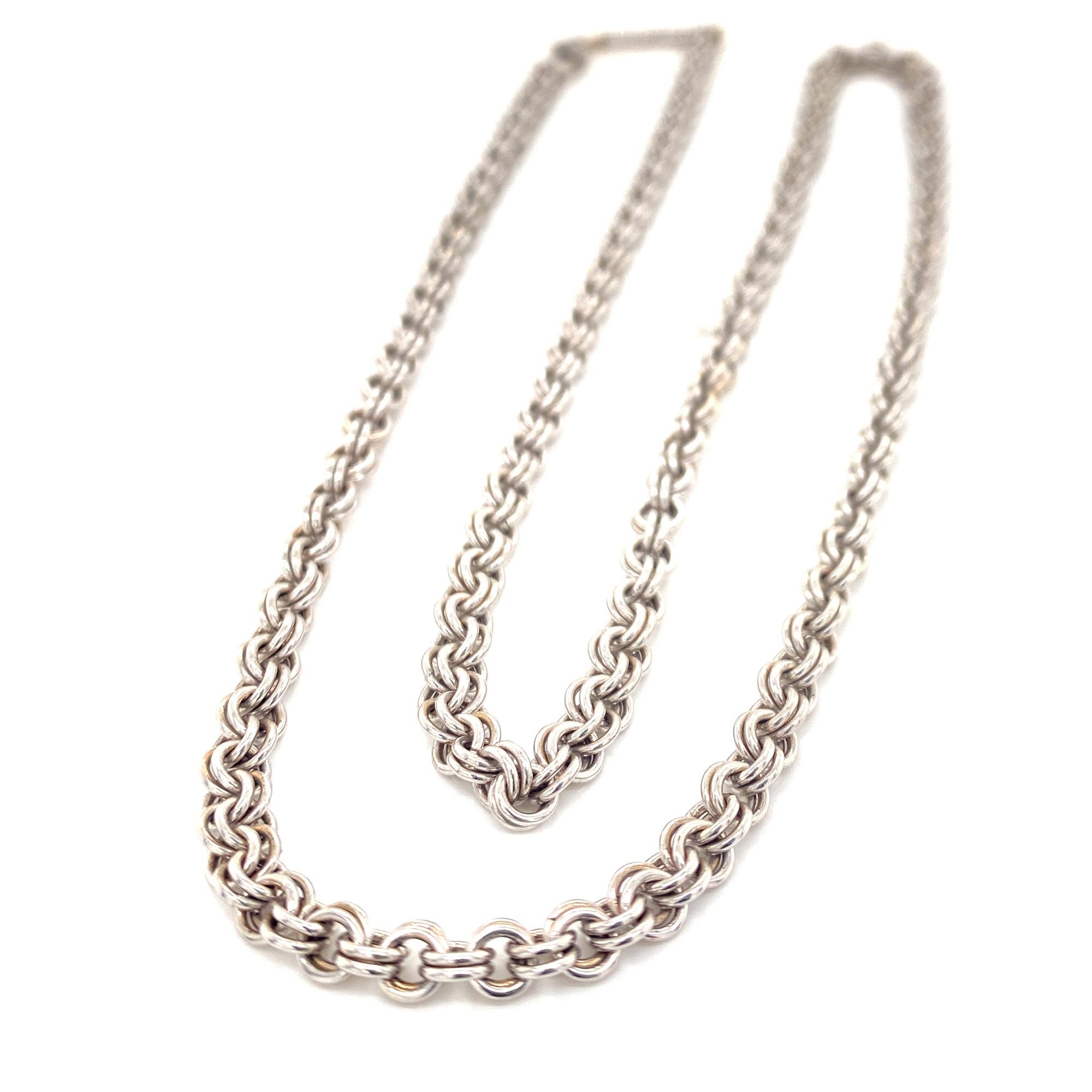 Stylish designer link chain by Italian designer Bvlgari. The double rolo 18K white gold links measure approximately 4mm in width, and the chain measures 21 inches in length. Signed Bvlgari Made In Italy. Weight: 25.1 grams.