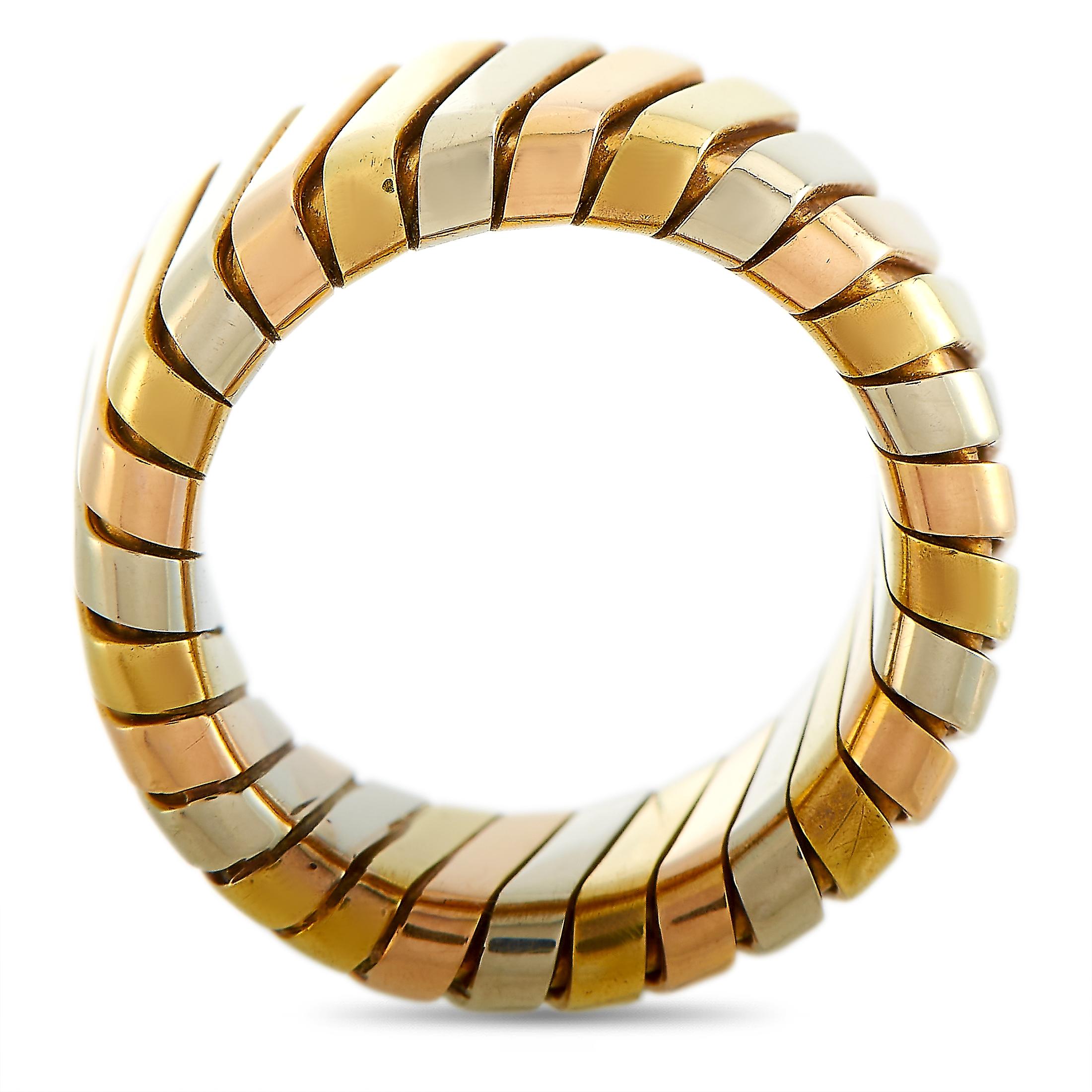 This Bvlgari tubogas ring is made out of 18K white, yellow and rose gold and weighs 13 grams, boasting band thickness of 10 mm.
 
 The ring is offered in estate condition and includes the manufacturer’s box.
Ring Size: 5.0