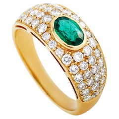 Bvlgari 18 Karat Yellow Gold 0.75 Carat Diamond and Emerald Ring