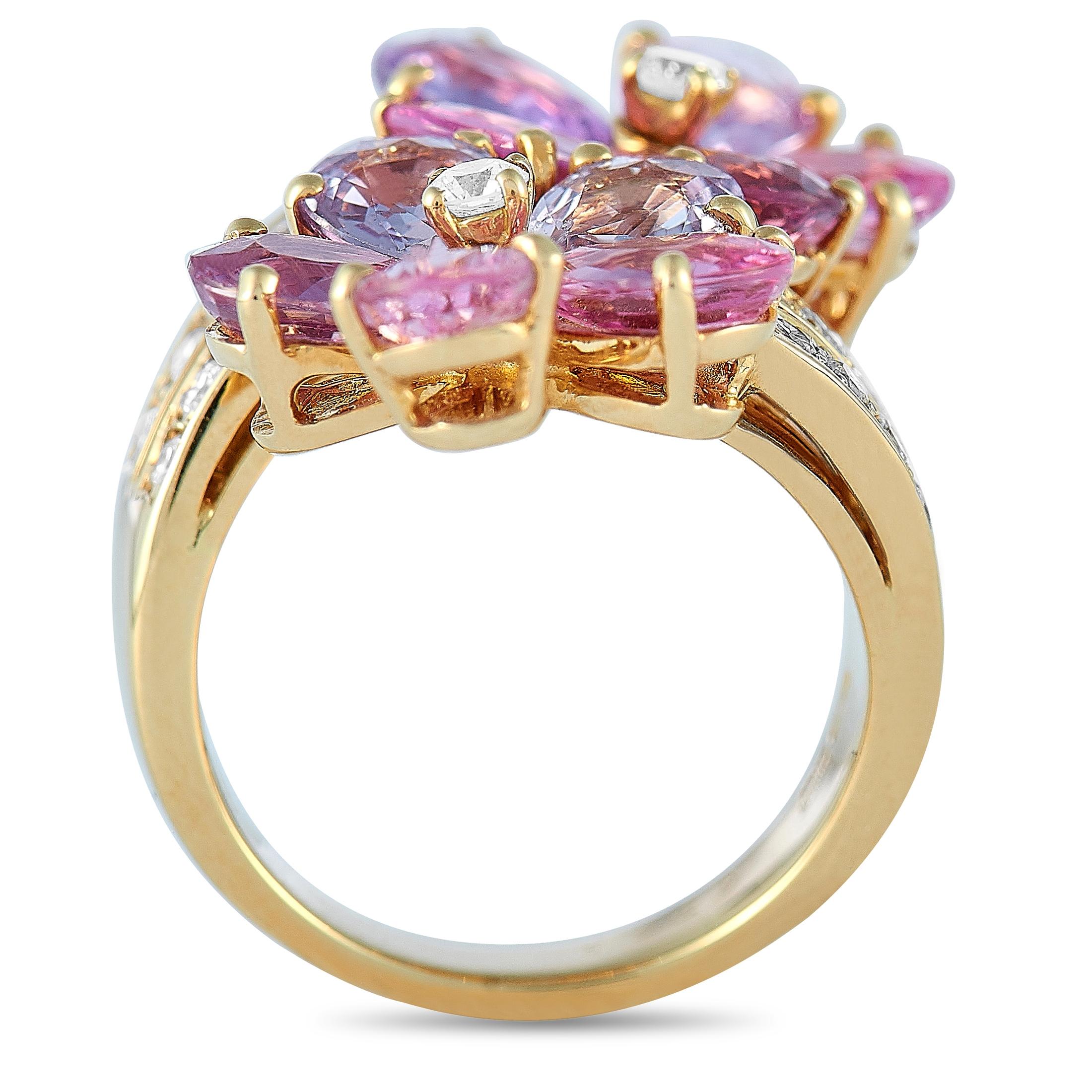 This Bvlgari ring is made of 18K yellow gold and weighs 13.1 grams, boasting band thickness of 3 mm and top height of 6 mm, while top dimensions measure 20 by 28 mm. The ring is embellished with diamonds and sapphires that total 0.80 and