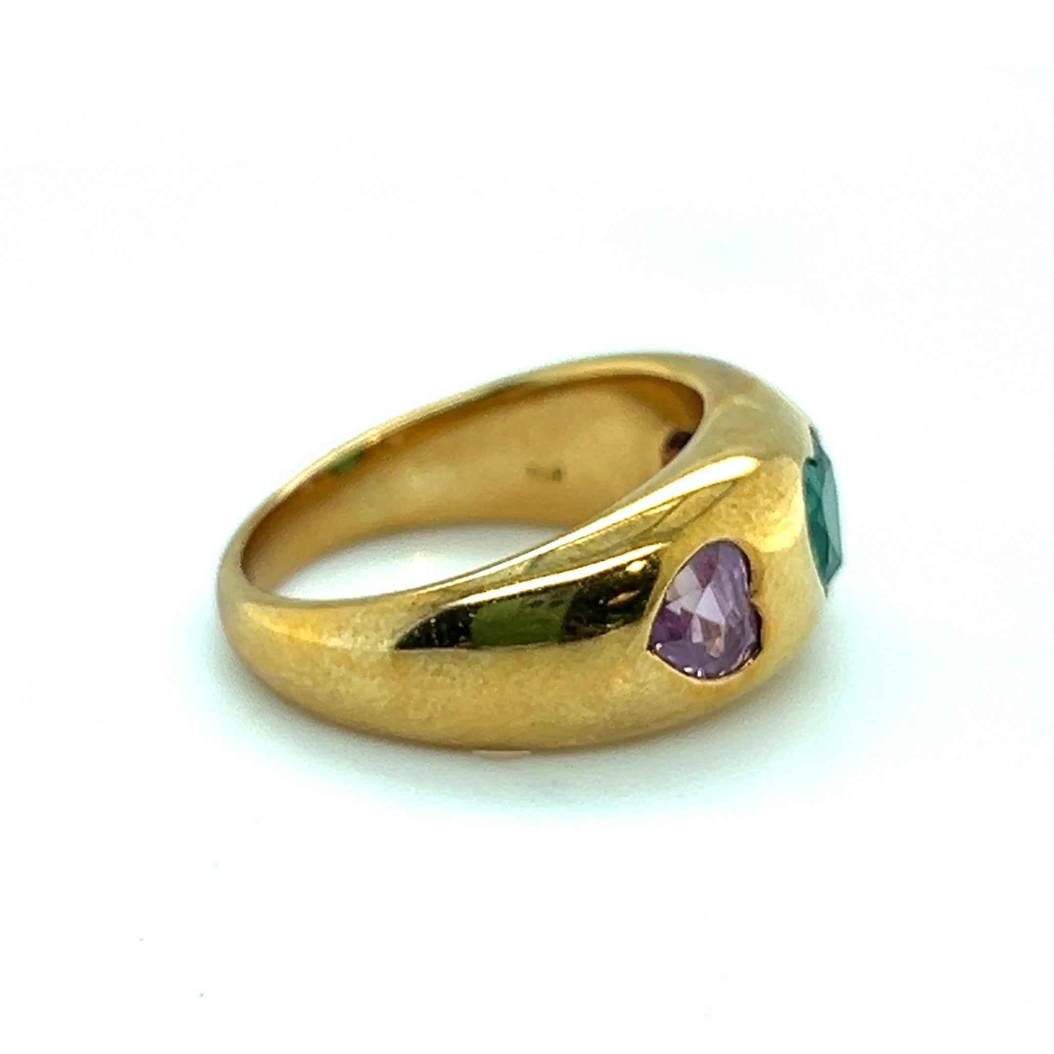 Modern Bvlgari 18 Karat Yellow Gold Emerald and Pink Sapphire Band Ring