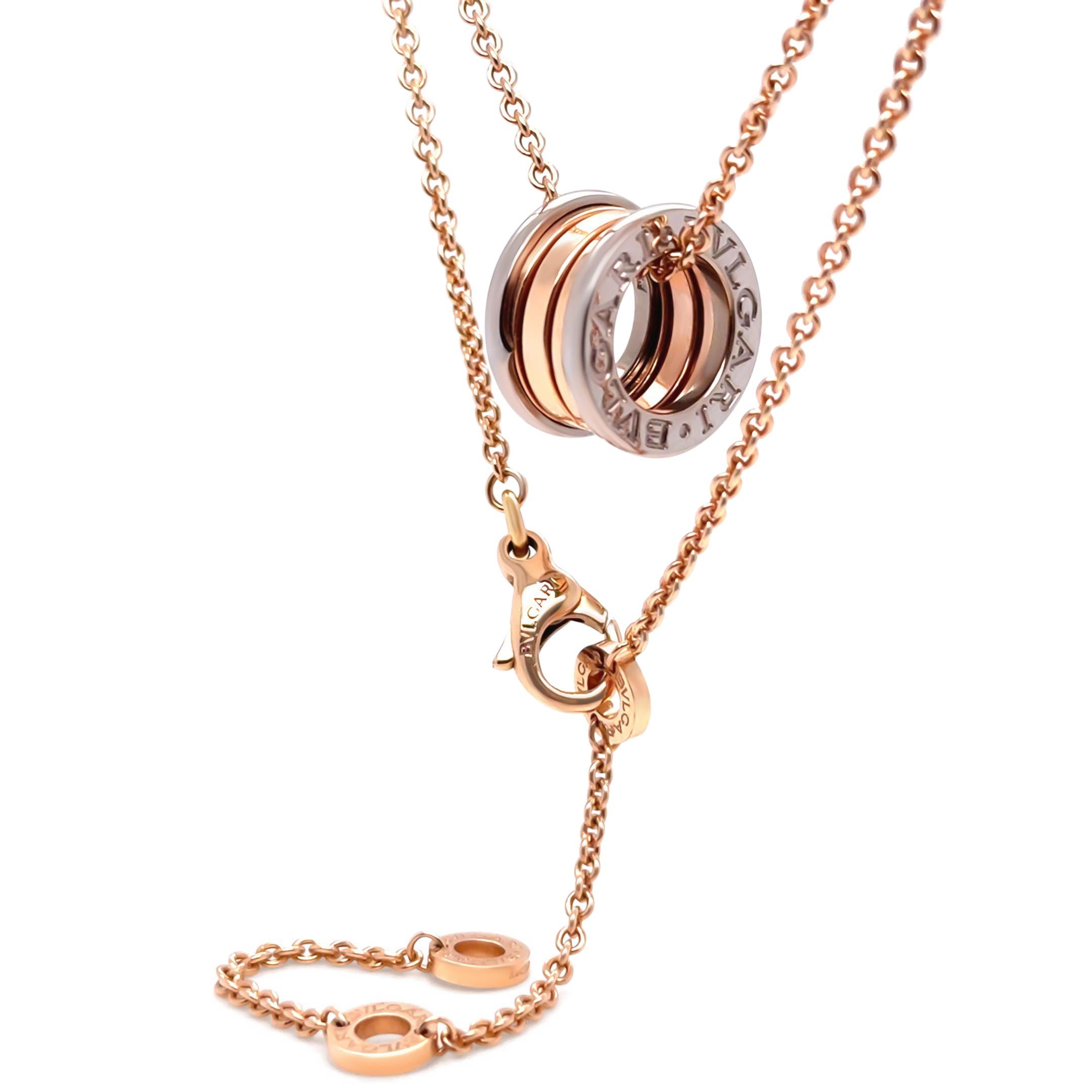 A striking Bvlgari B.Zero1 Perfect Mistake Necklace, expertly crafted in 18ct pink and white gold. This iconic piece features a distinctive spiral pendant, measuring approximately 9mm in width and 14mm in diameter, suspended from an adjustable chain