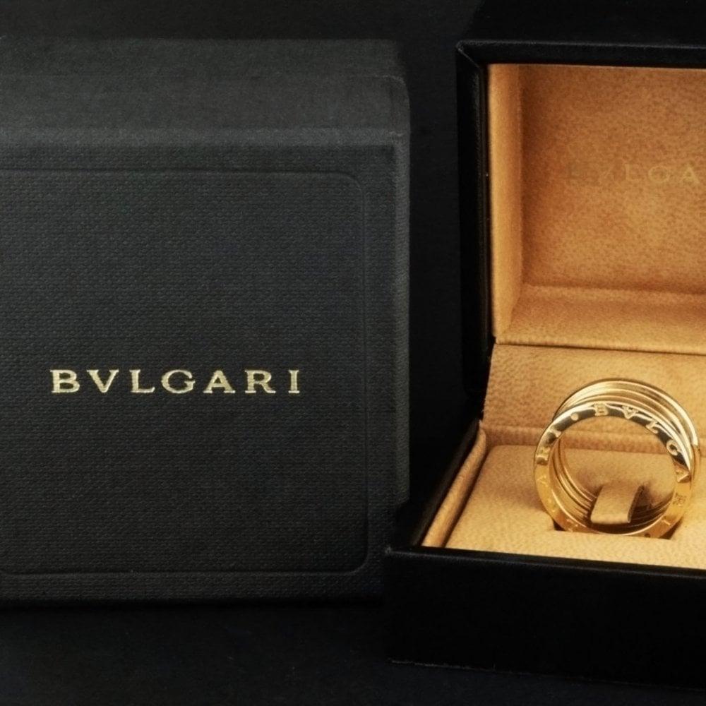 Condition: Pre-owned with mild/light scratches
Material: 18ct Yellow Gold
Hallmarked: Yes. Full Bvlgari Hallmark
Item Weight: 14.2g
Size: Approx. UK S Stamped European Size 60
Ring Band Width: 11mm