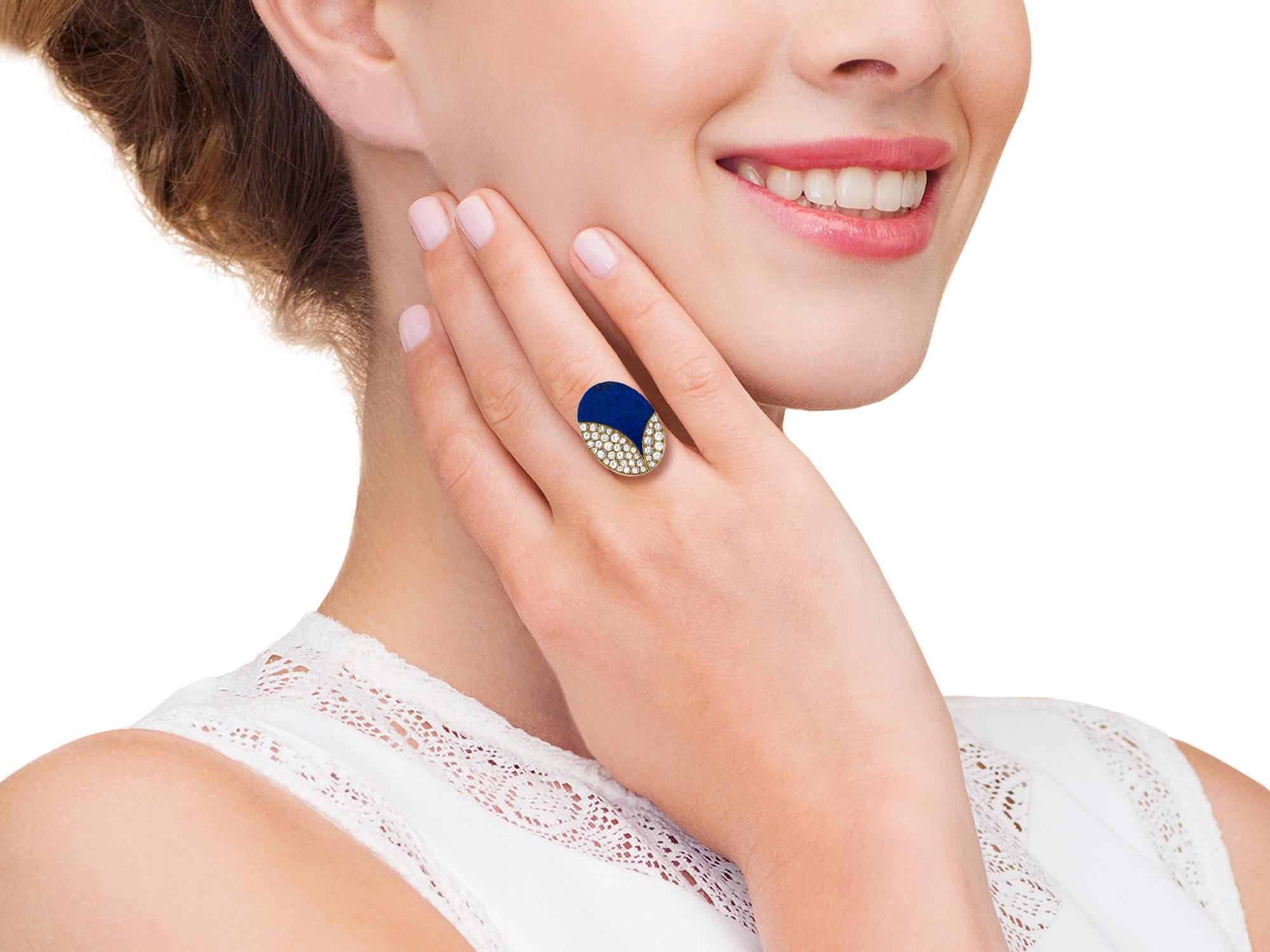 An abstract oval Lapis and Diamond (weighing 1.10cts approximately) ring, signed by Bvlgari.  Made in France. 