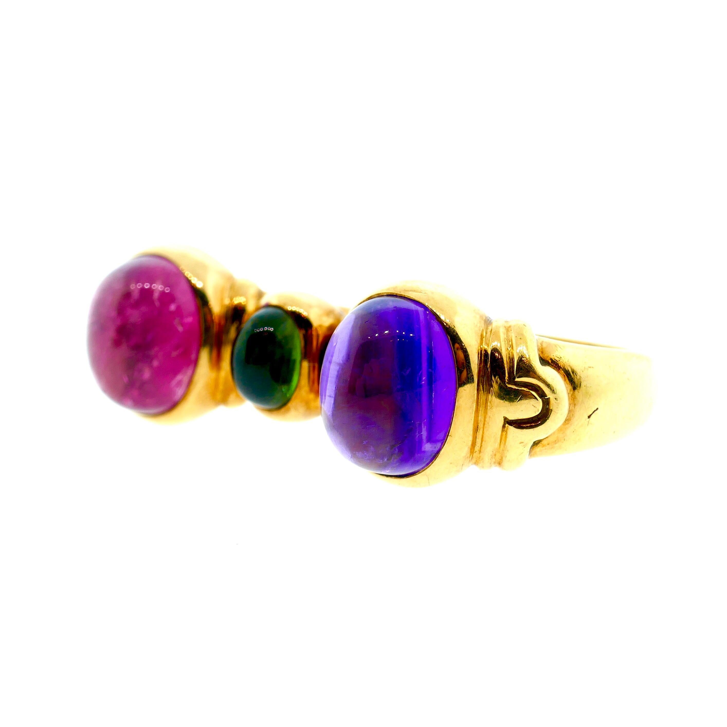 Bvlgari 18k Gold, Amethyst, Peridot, Tourmaline Two Finger Ring

This is a very stylish and rare Bvlgari two finger ring. It features intense colored amethyst, peridot, and tourmaline. 

Size: 6.75 (US) & 6.25 (US)

Weight: 23 Grams

Signature /