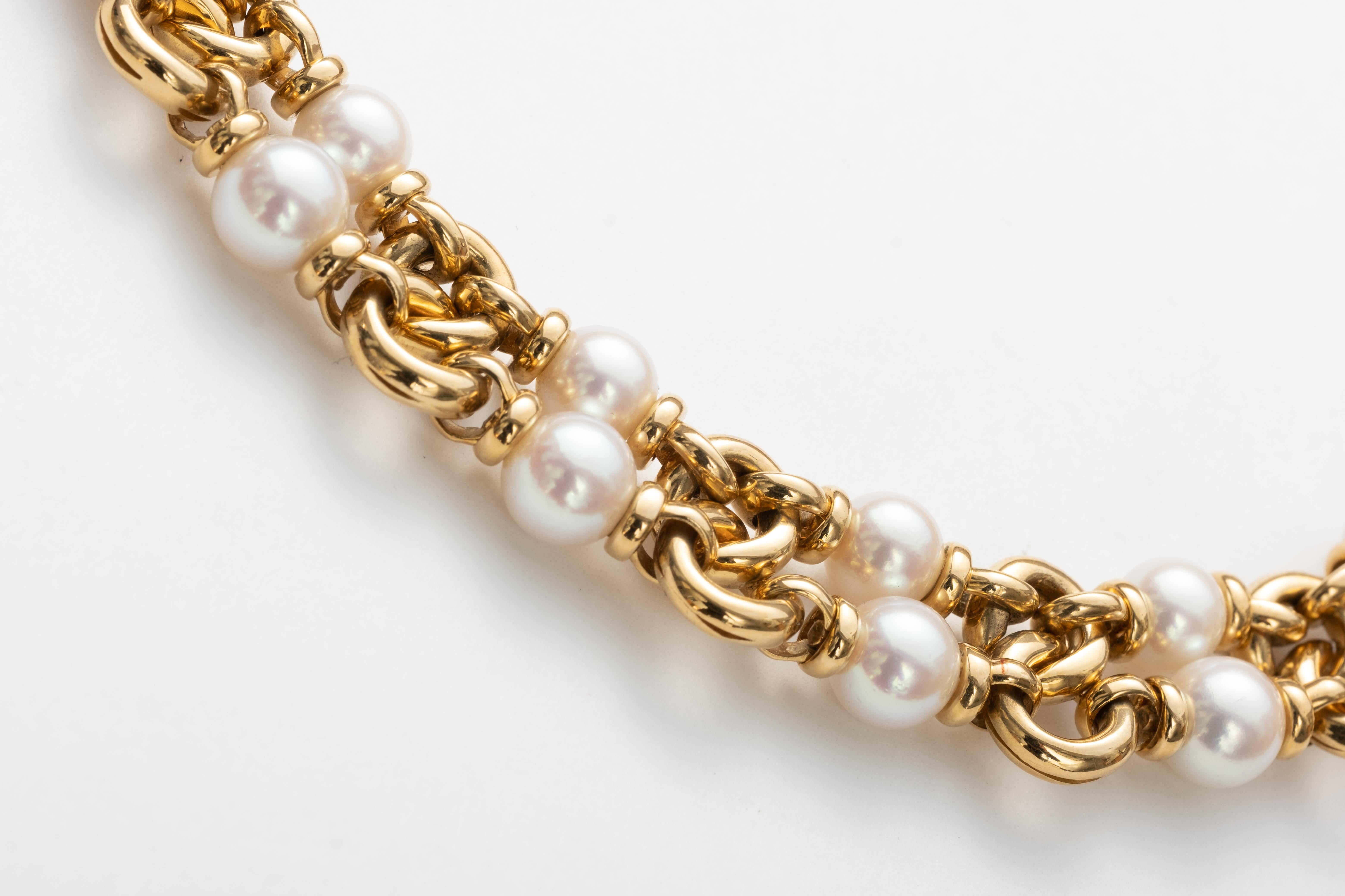 Bvlgari signed 18k Gold and Pearl Necklace. Weighs 73.25 dwt and measures 15.25
