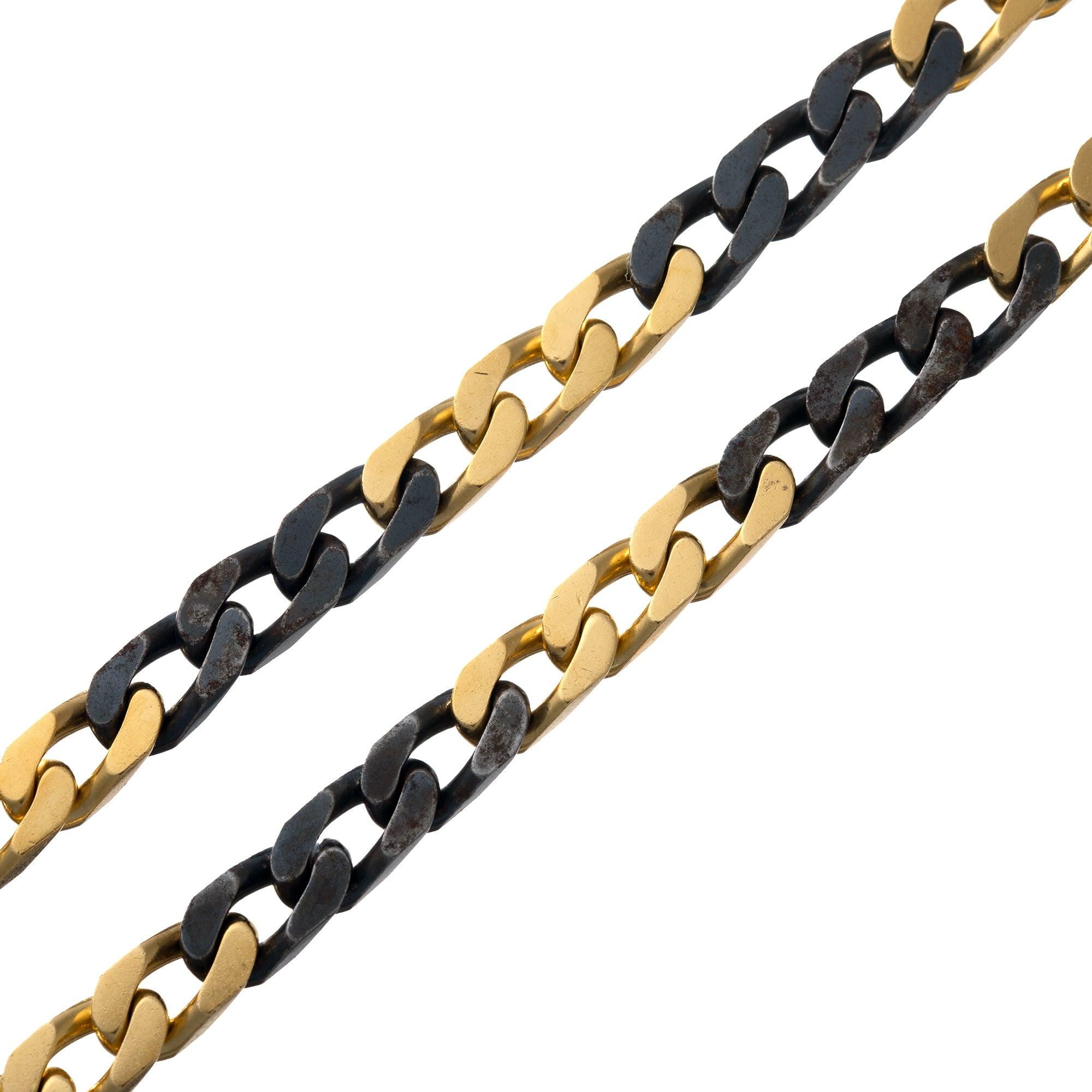 A classic Bvlgari 1990's long chain necklace in 18 karat yellow gold and blackened steel. Designed as a flattened curb link-style necklace with an alternating series of three polished 18k yellow gold links and then three blackened steel links.  Can