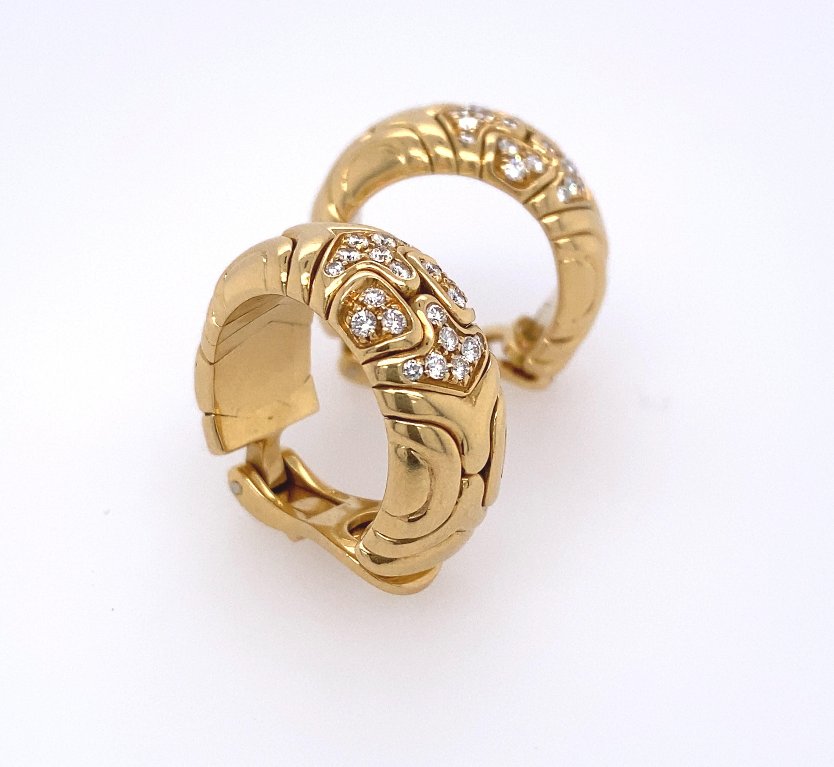 Bvlgari 18k Gold Diamond earrings 
Total weight 19.8 dwt Measurements 9.72 mm x 23.20 mm 