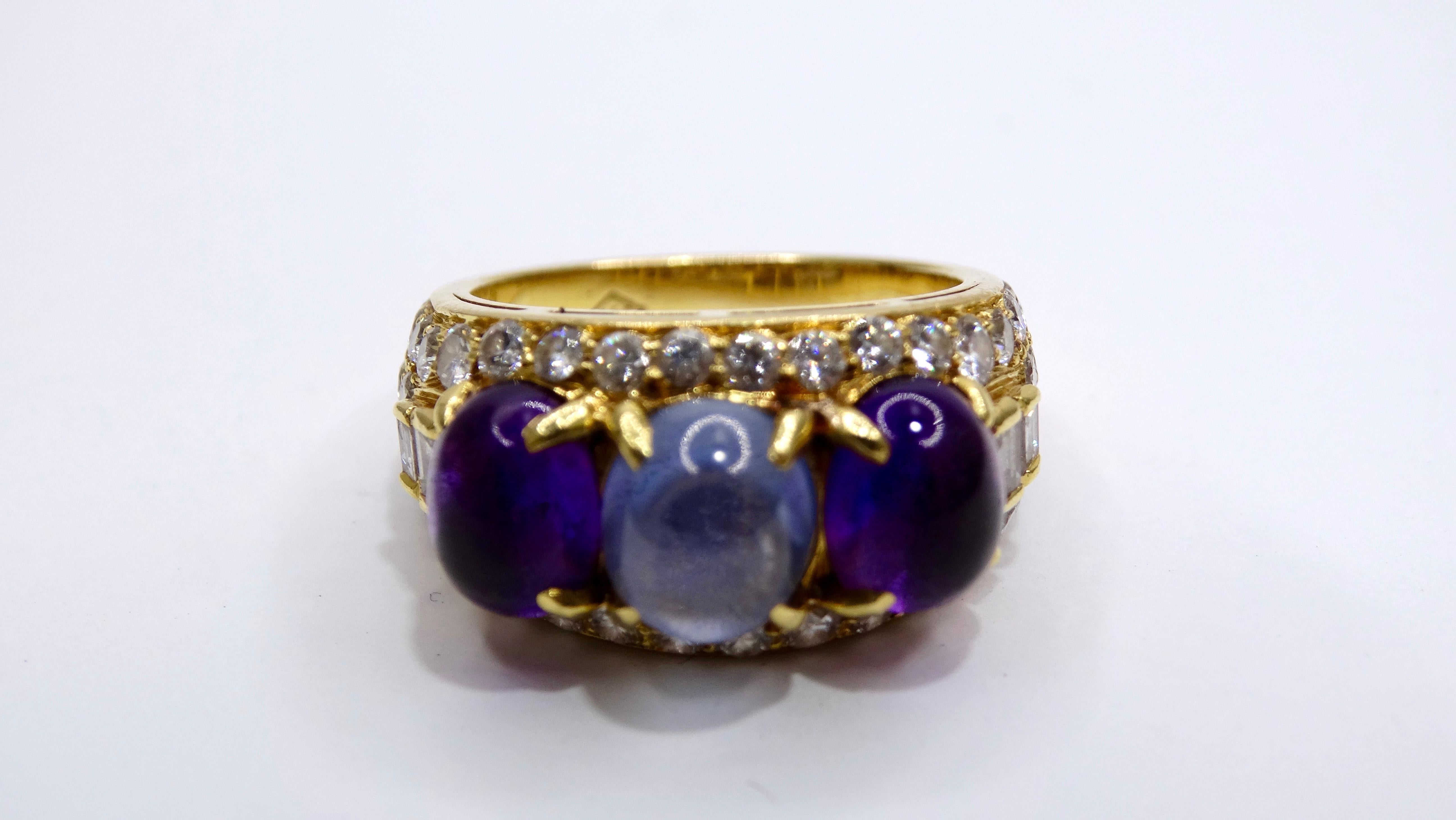 Don't miss out on this vintage rarity, 18k gold BVLGARI eclectic piece from the 1970's. One blue cabochon sapphire is centered and accompanied by two purple cabochon Amethyst. These stones, are surrounded by baguette encrusted diamonds that range